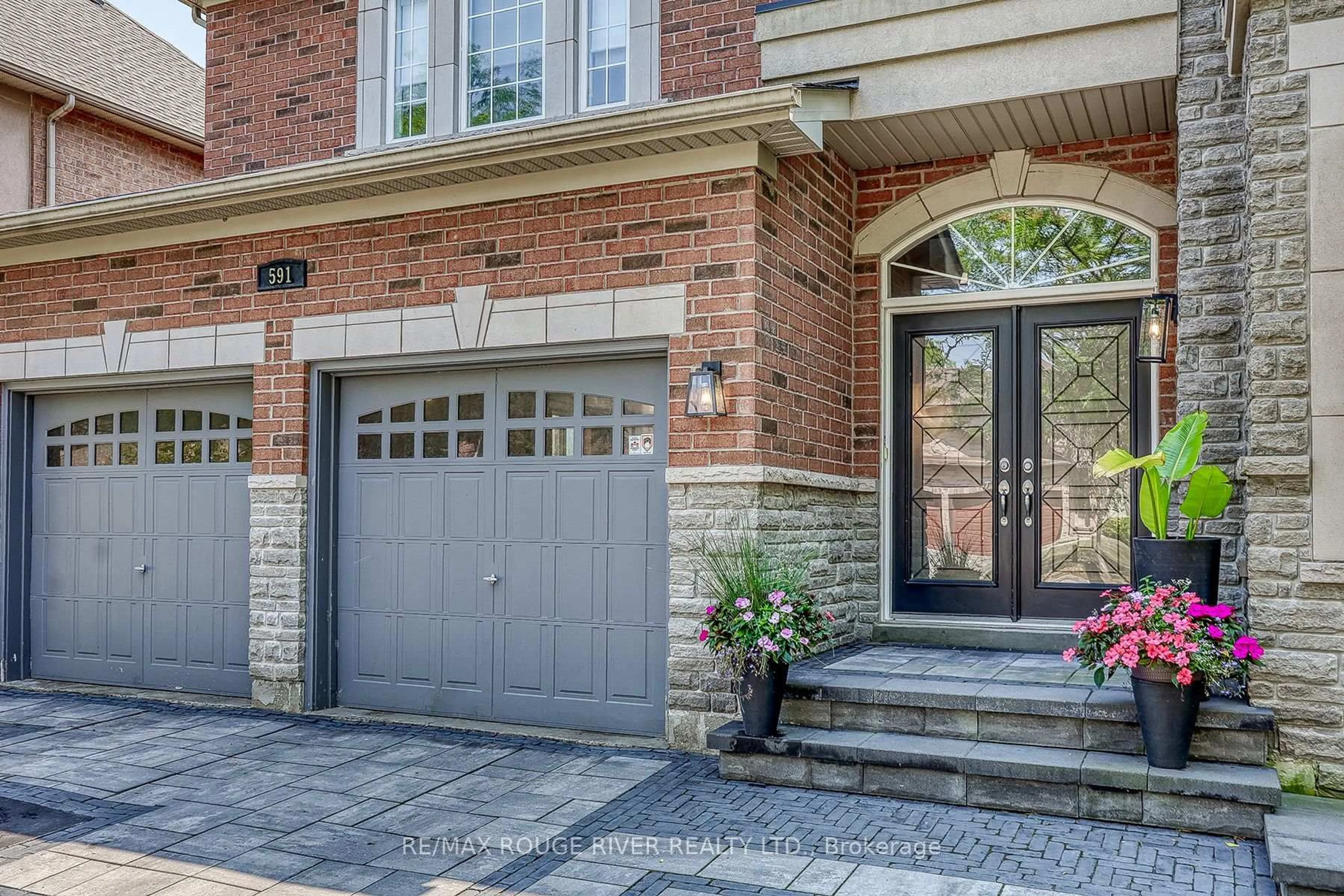 Home with brick exterior material, street for 591 Maitland Dr, Pickering Ontario L1W 3T6