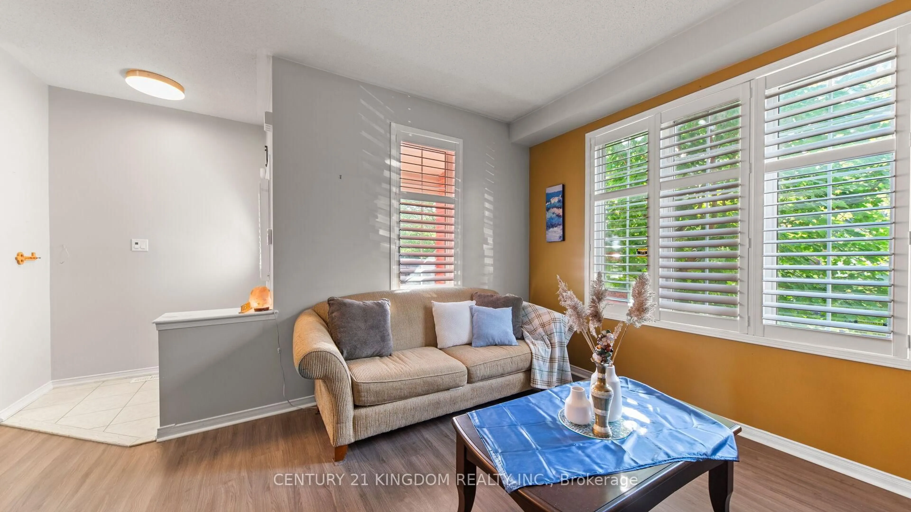 Living room with furniture, wood/laminate floor for 35 Haskell Ave, Ajax Ontario L1T 4Y8