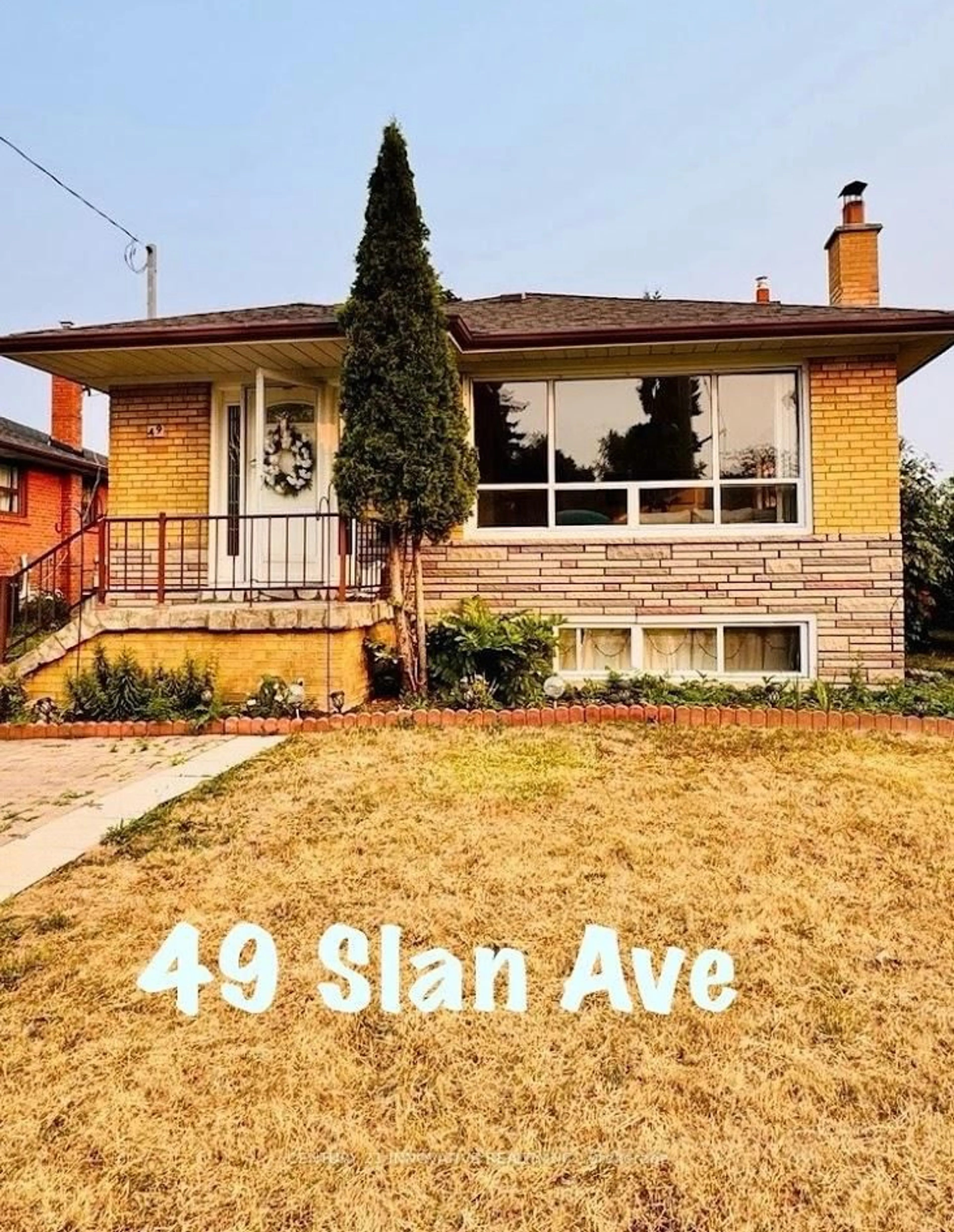 Home with brick exterior material, street for 49 Slan Ave, Toronto Ontario M1G 3B4
