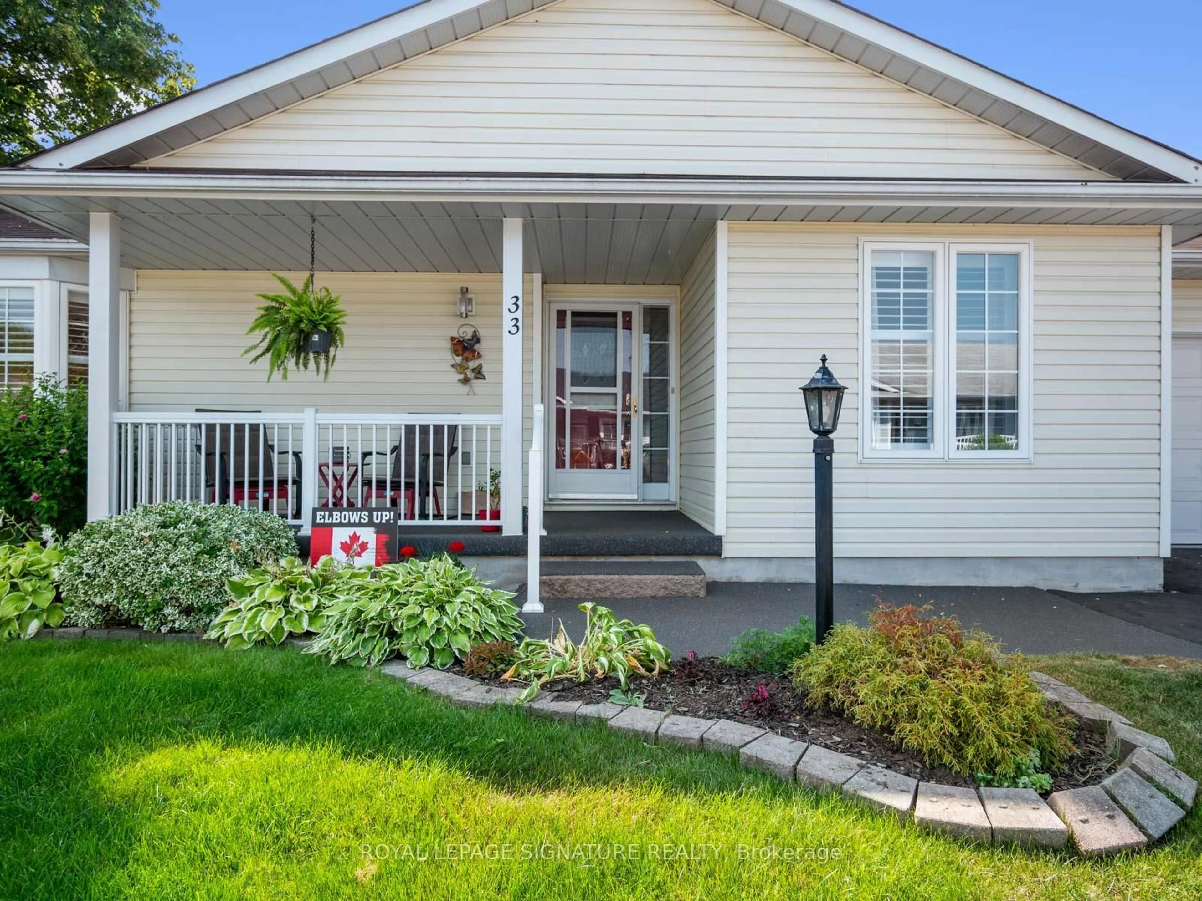 Home with vinyl exterior material, street for 33 Steelhead Lane, Clarington Ontario L1B 1B3