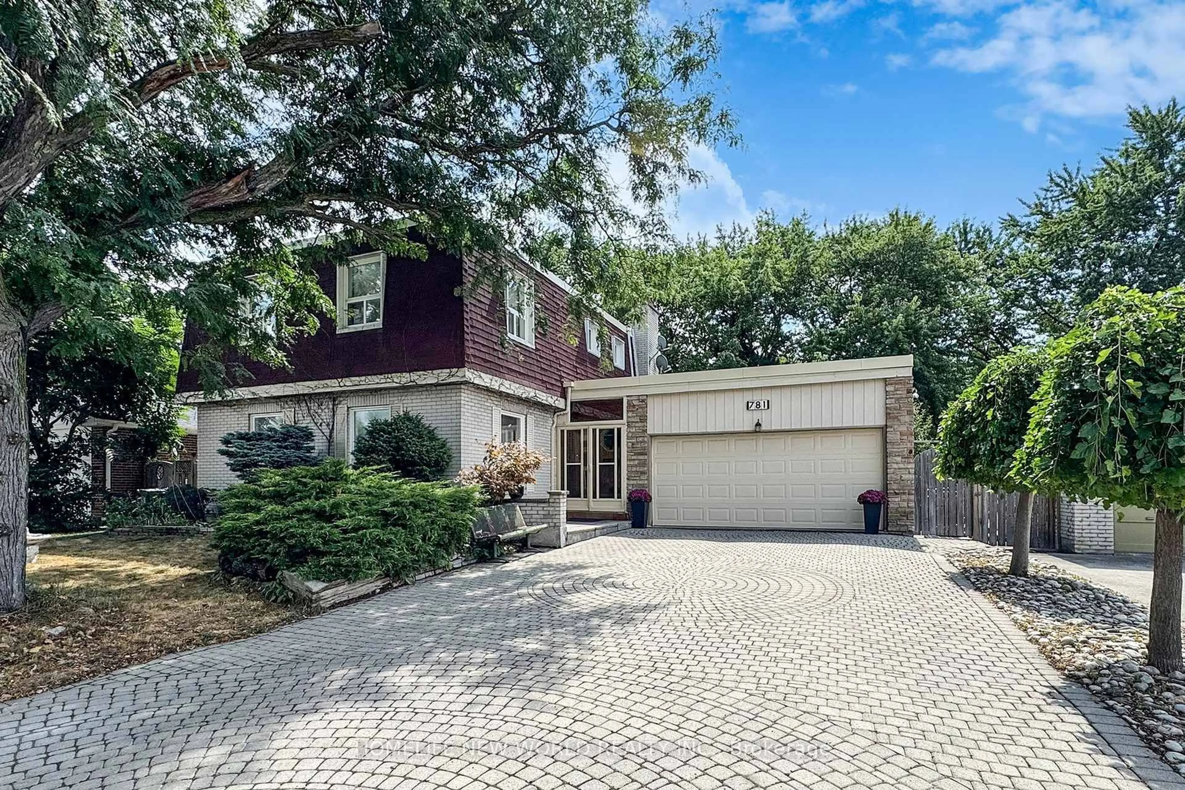 Home with brick exterior material, street for 781 Huntingwood Dr, Toronto Ontario M1T 2L5
