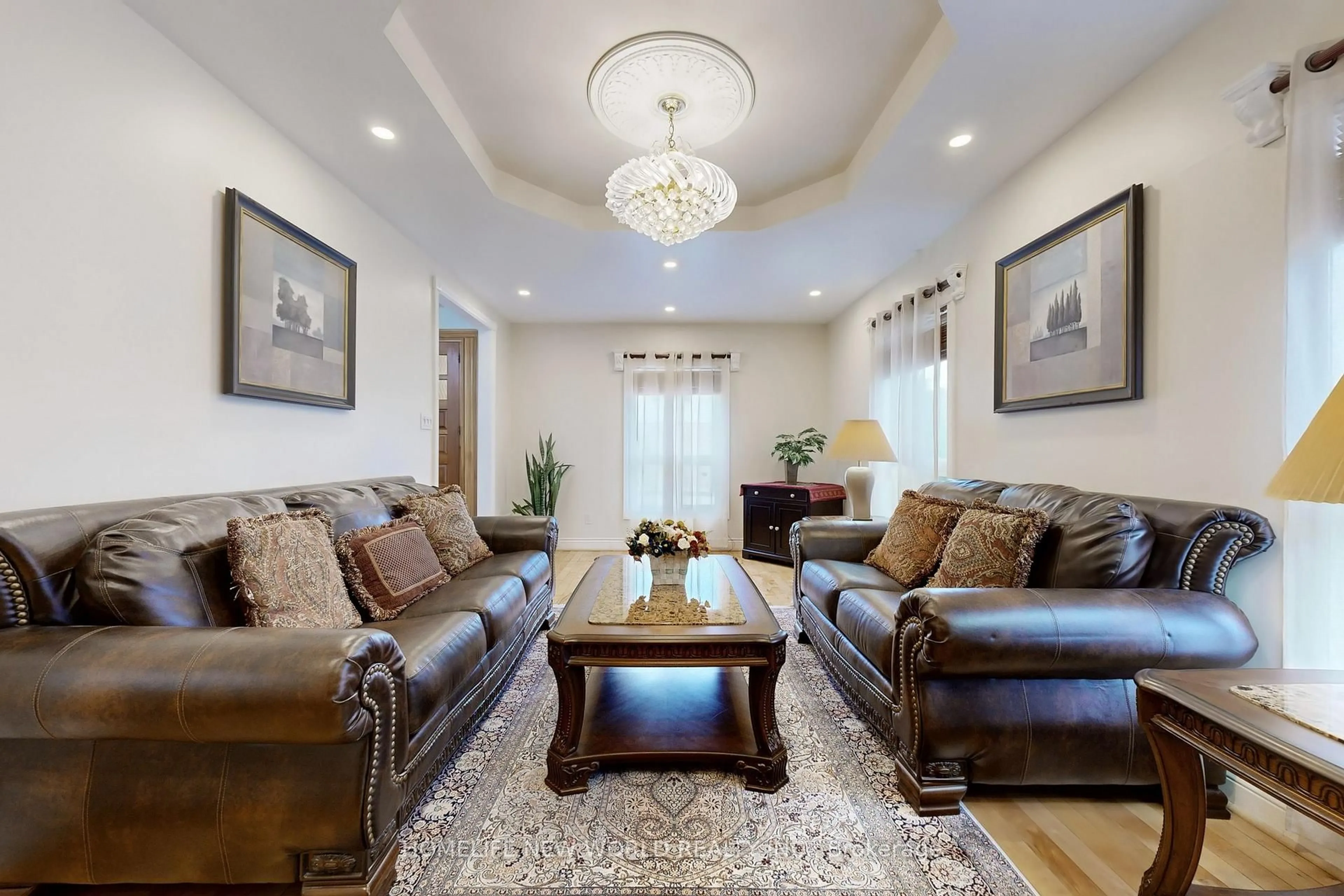 Living room with furniture, unknown for 781 Huntingwood Dr, Toronto Ontario M1T 2L5