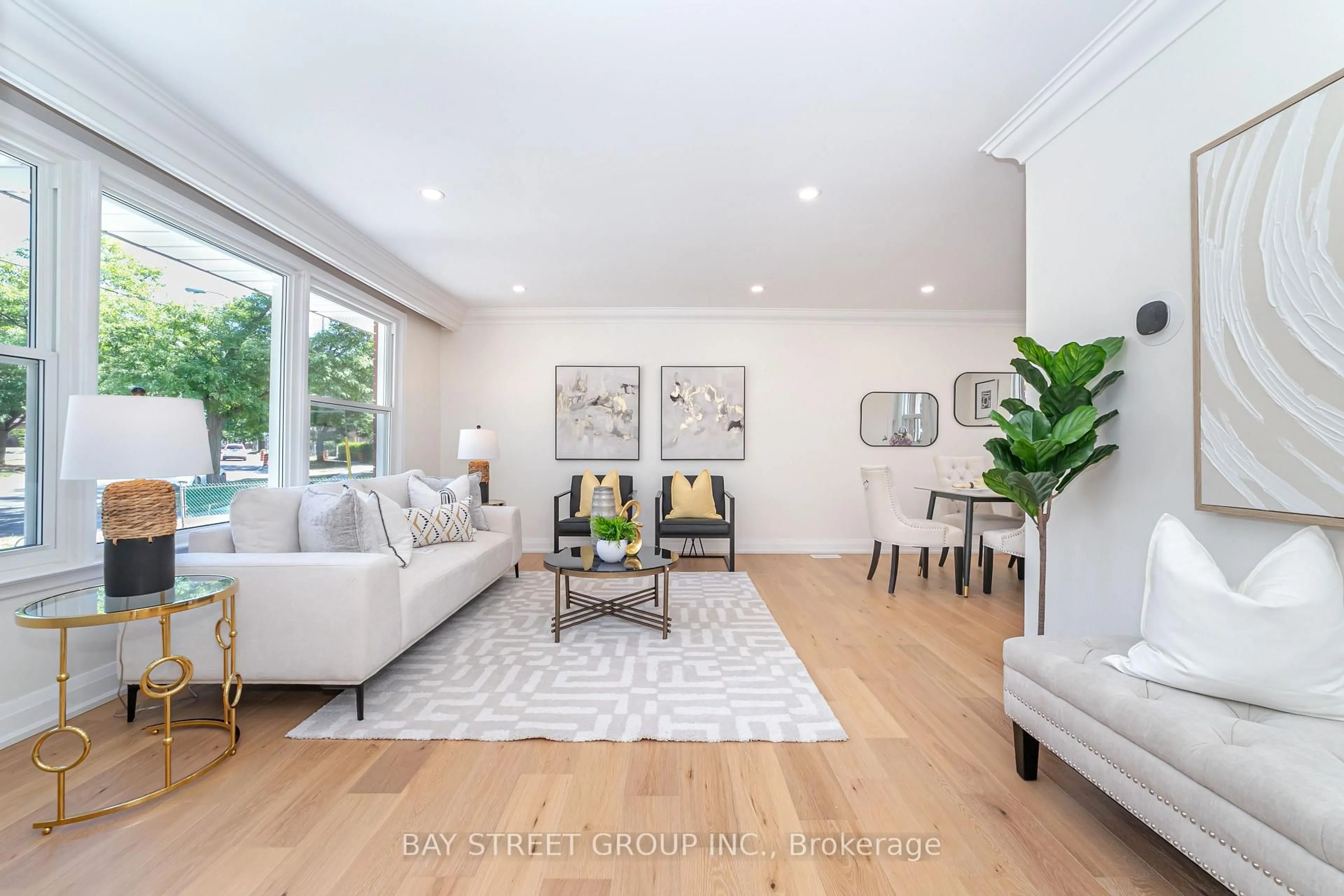 Living room with furniture, wood/laminate floor for 839 Brimorton Dr, Toronto Ontario M1G 2T3