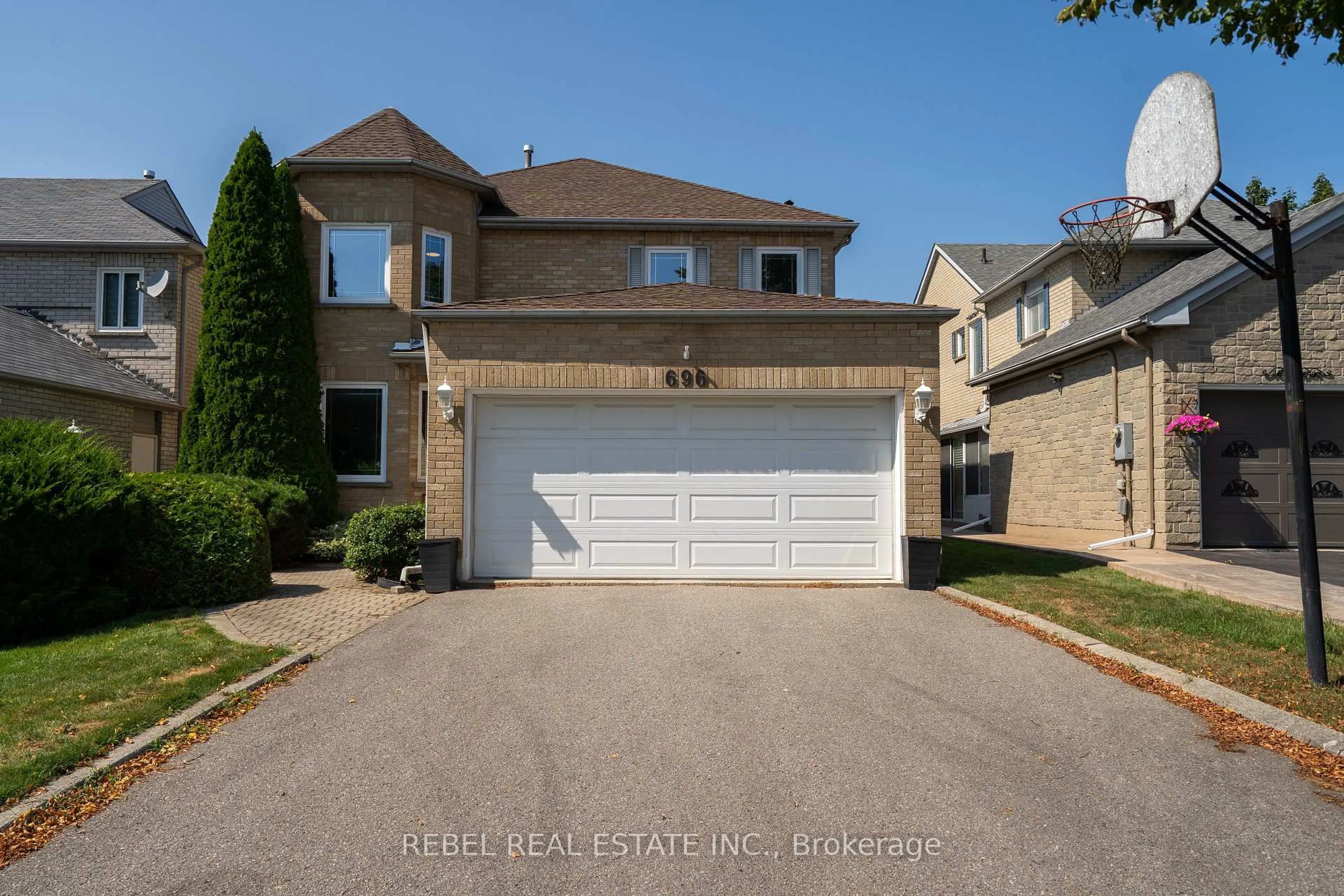 Home with brick exterior material, street for 696 Atwood Cres, Pickering Ontario L1W 3W4