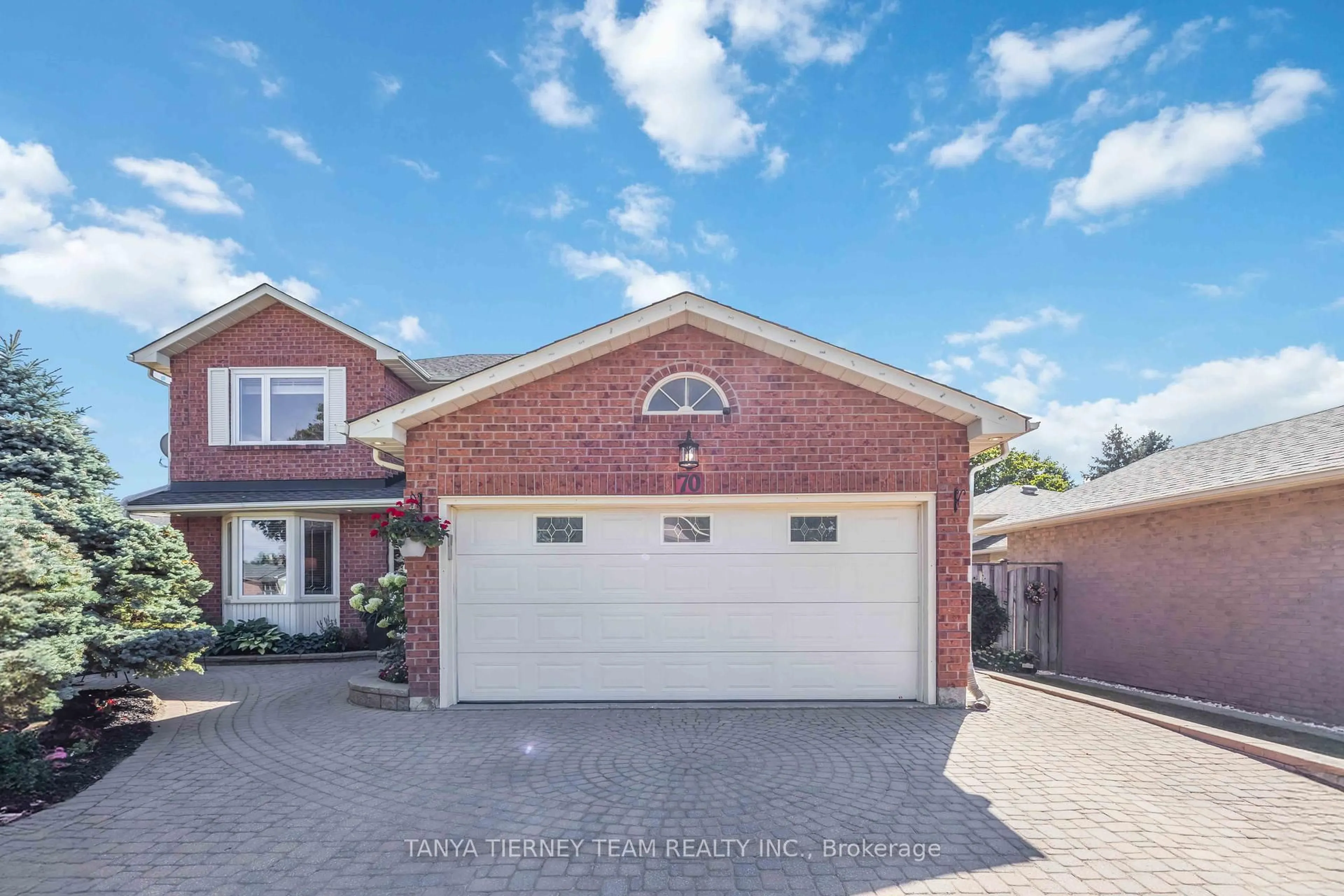 Home with brick exterior material, street for 70 Canadian Oaks Dr, Whitby Ontario L1N 7G6