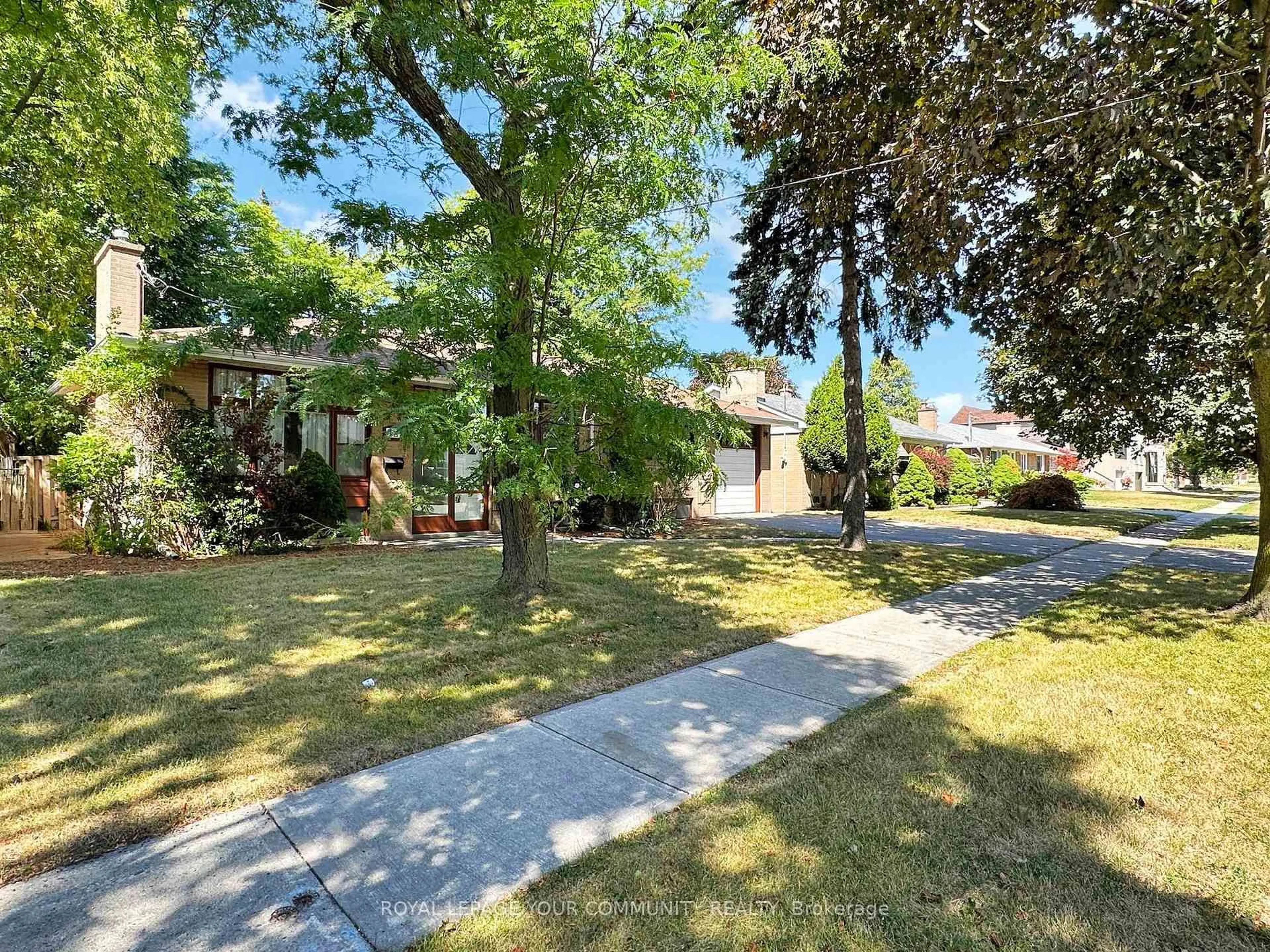 A pic from outside/outdoor area/front of a property/back of a property/a pic from drone, street for 12 Nobert Rd, Toronto Ontario M1T 1C1