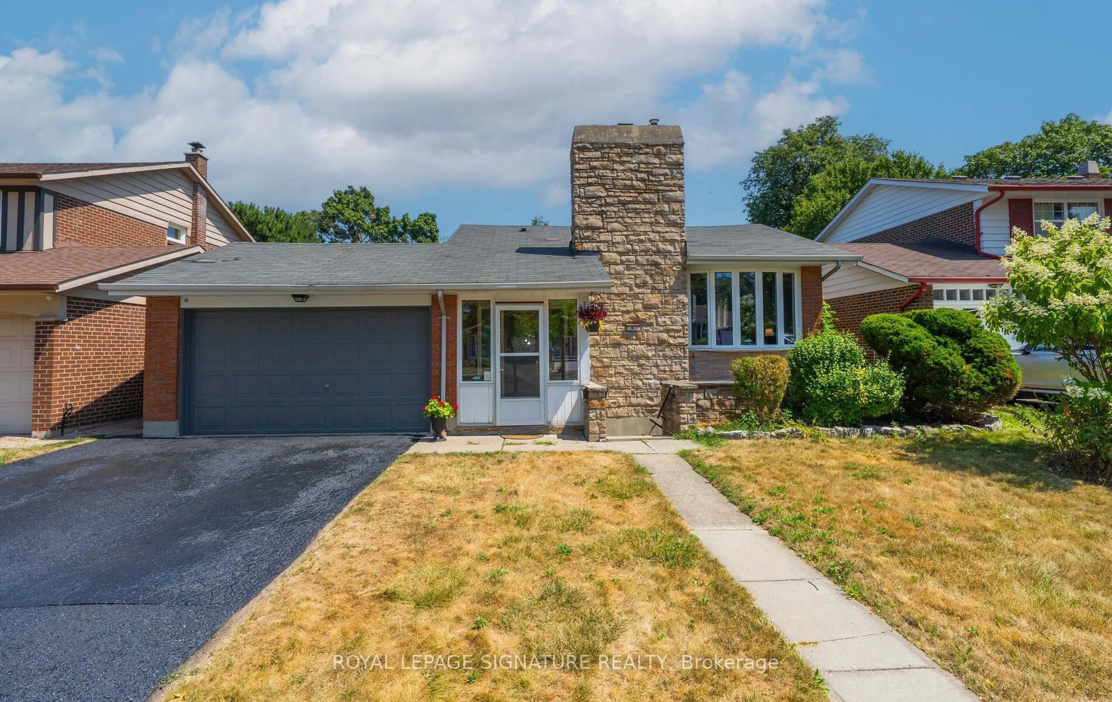 Home with brick exterior material, street for 9 Bridlewood Blvd, Toronto Ontario M1T 1P3