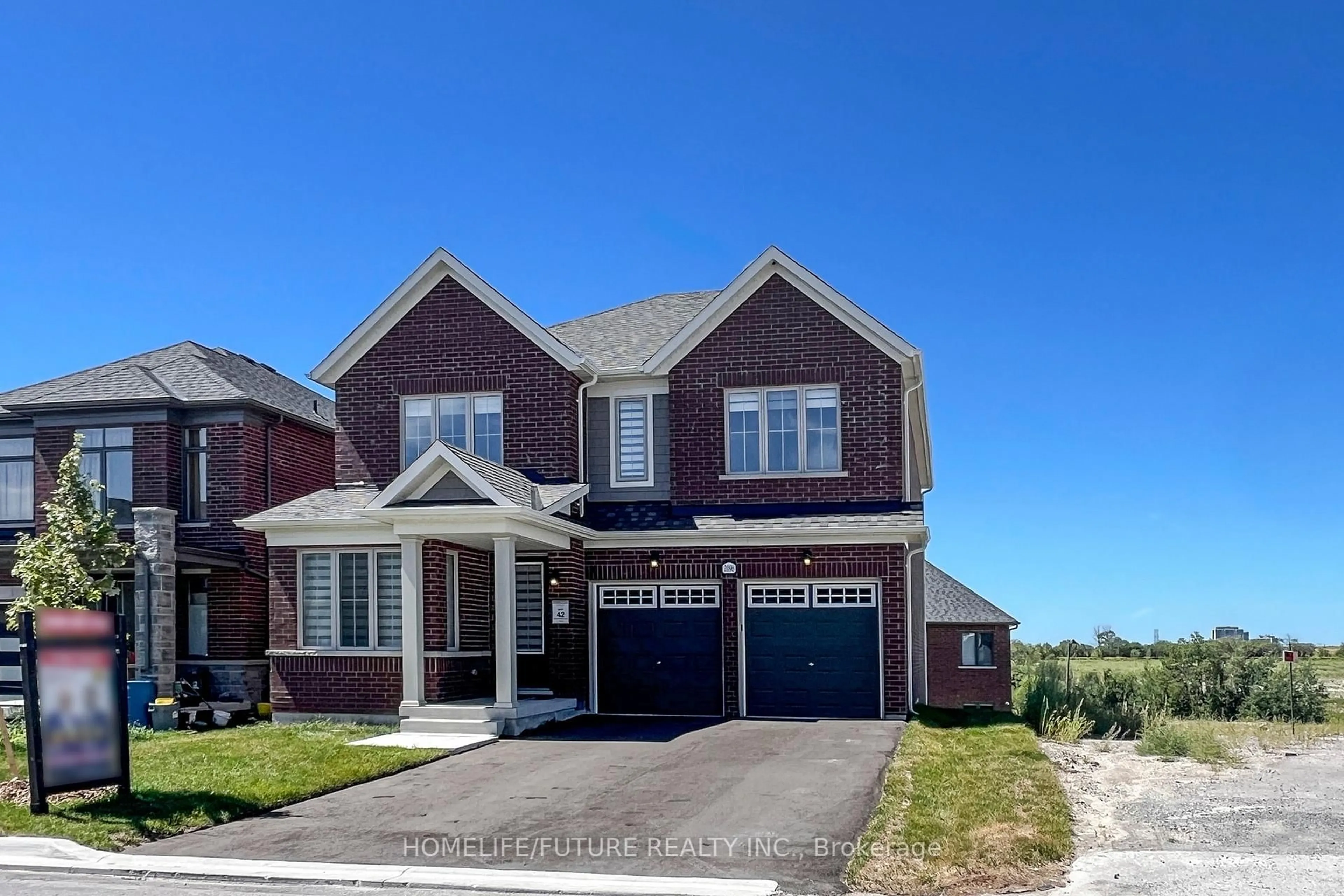 Home with brick exterior material, street for 2096 Chris Mason St, Oshawa Ontario L1L 0S6