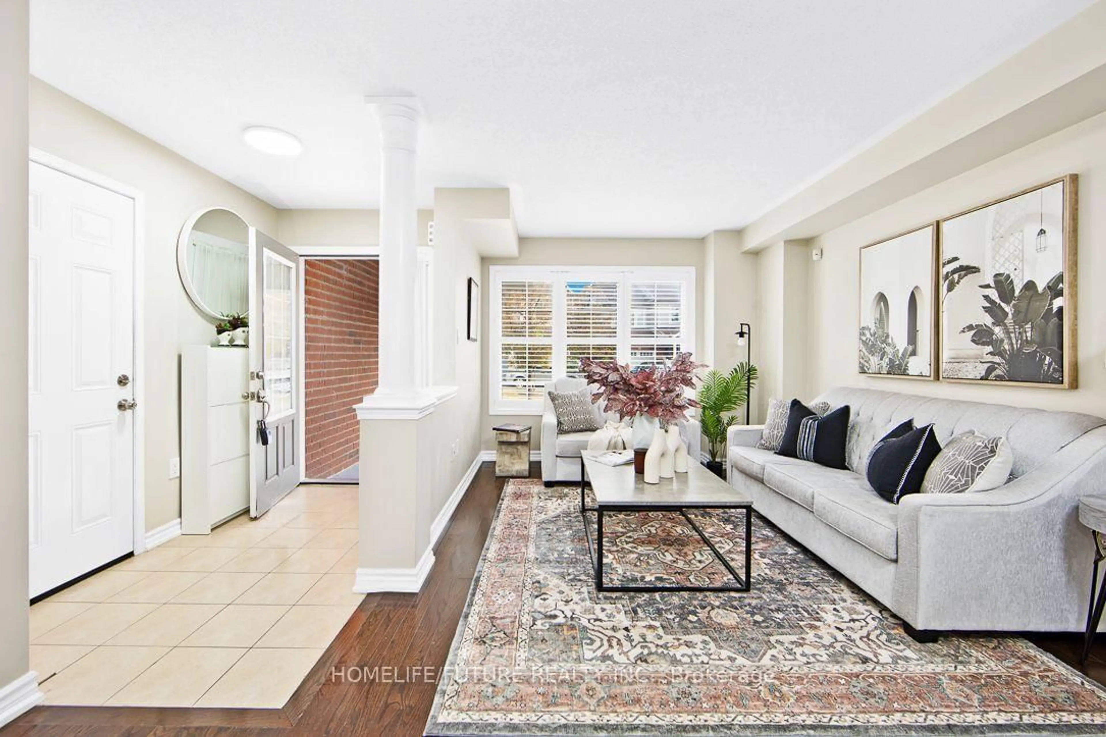 Living room with furniture, ceramic/tile floor for 40 Oswell Dr, Ajax Ontario L1Z 0L4