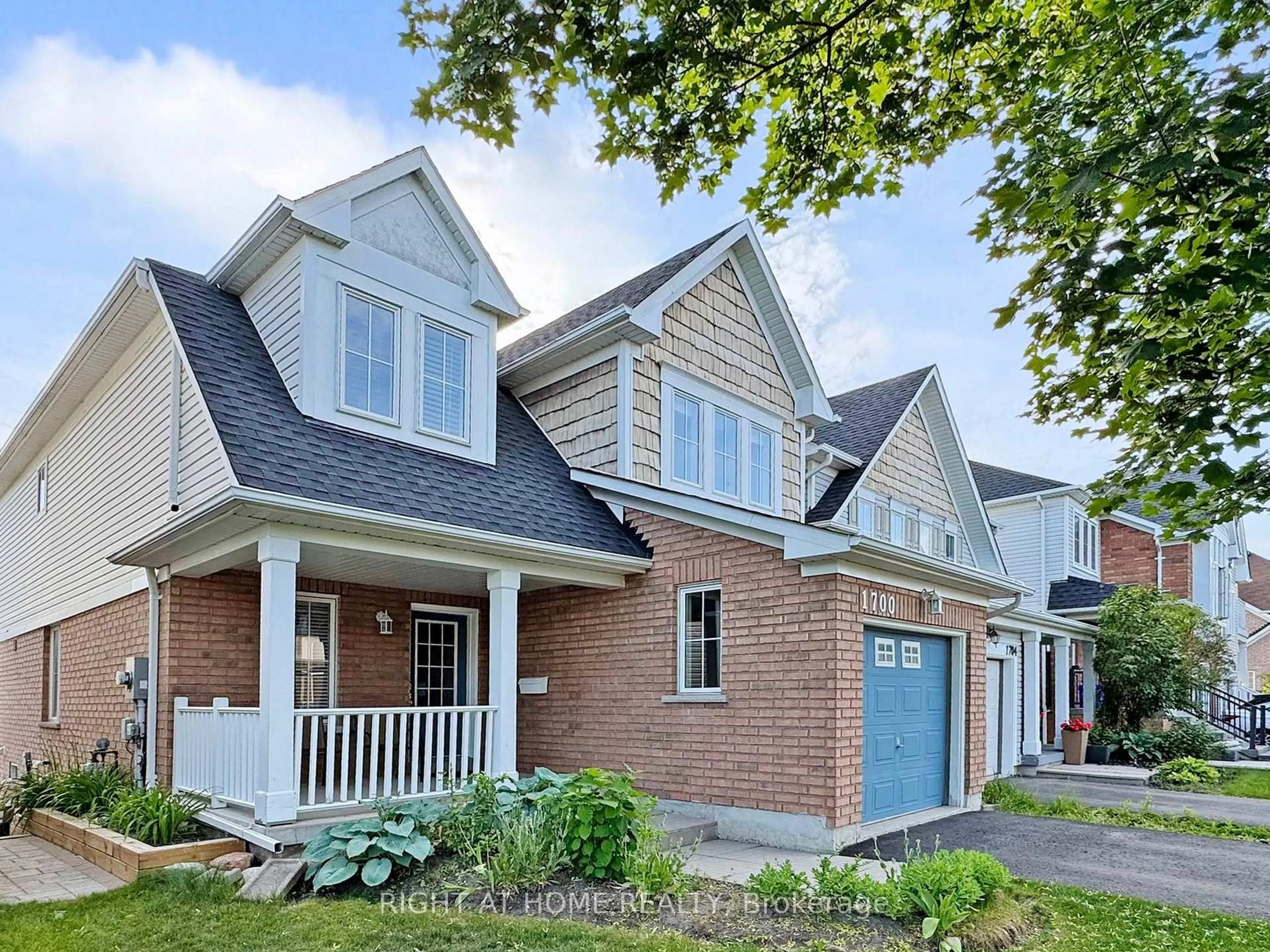 Home with brick exterior material, street for 1700 Spencely Dr, Oshawa Ontario L1K 0B2