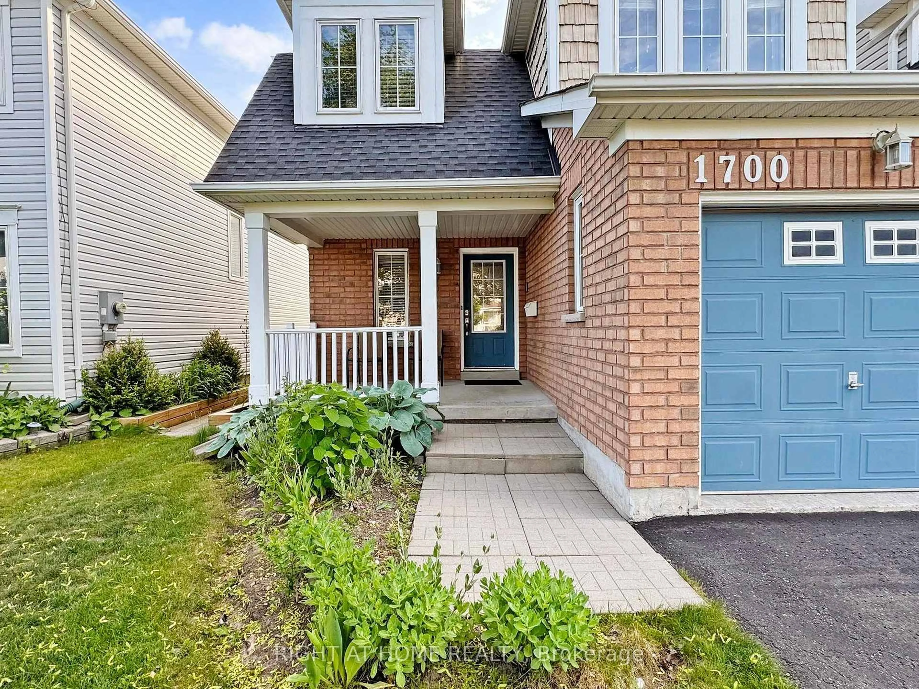 Home with brick exterior material, street for 1700 Spencely Dr, Oshawa Ontario L1K 0B2