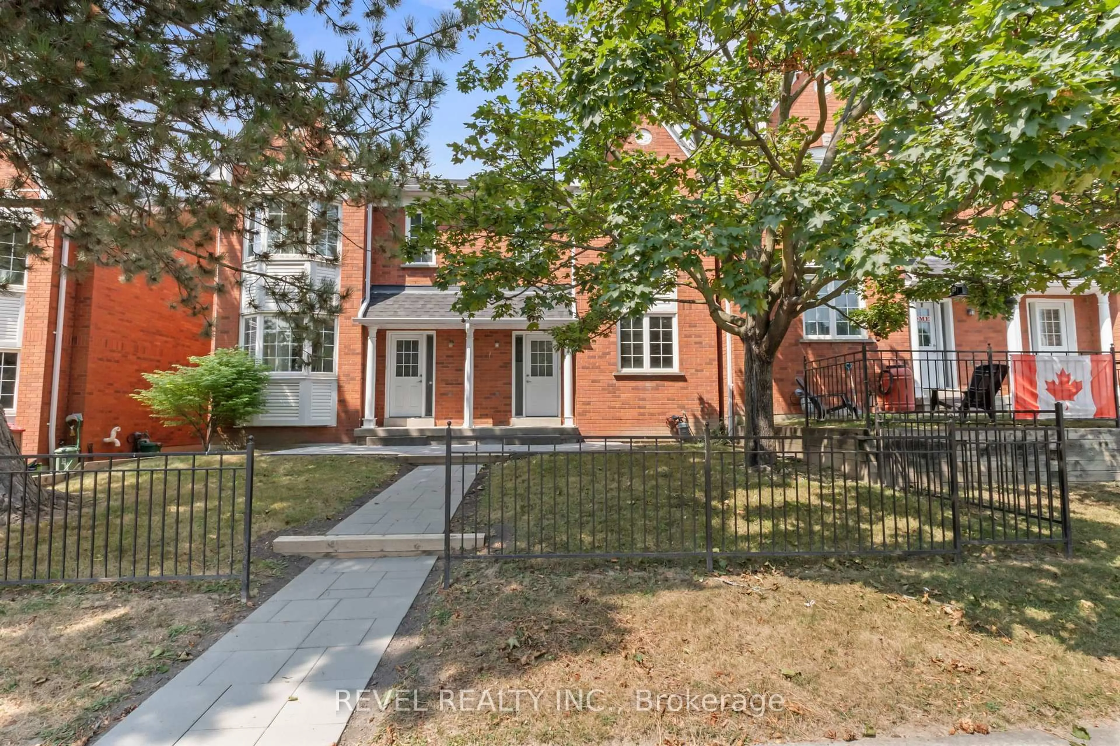 Home with brick exterior material, street for 10 Bassett Blvd #56, Whitby Ontario L1N 9C4