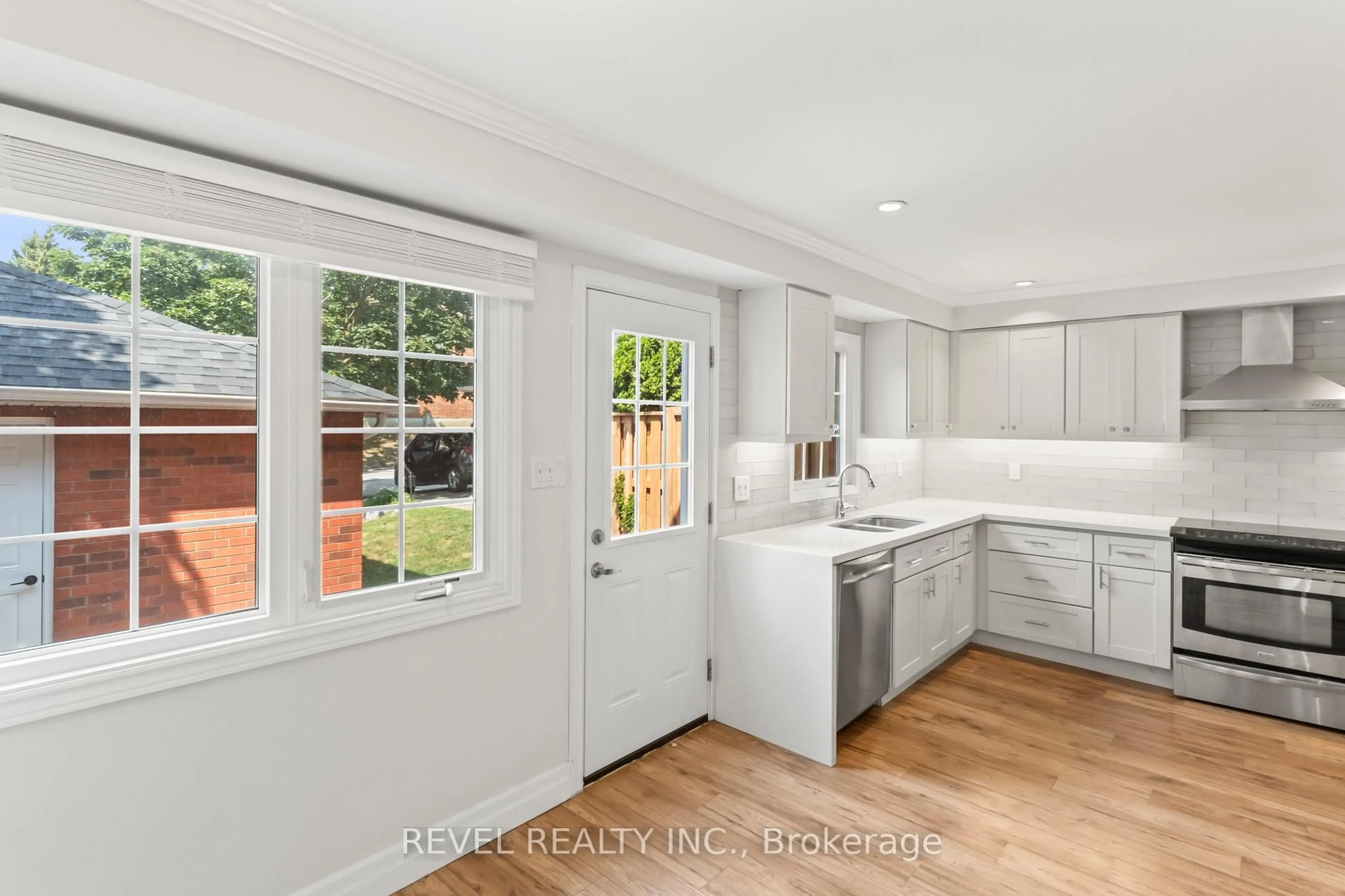 Open concept kitchen, unknown for 10 Bassett Blvd #56, Whitby Ontario L1N 9C4