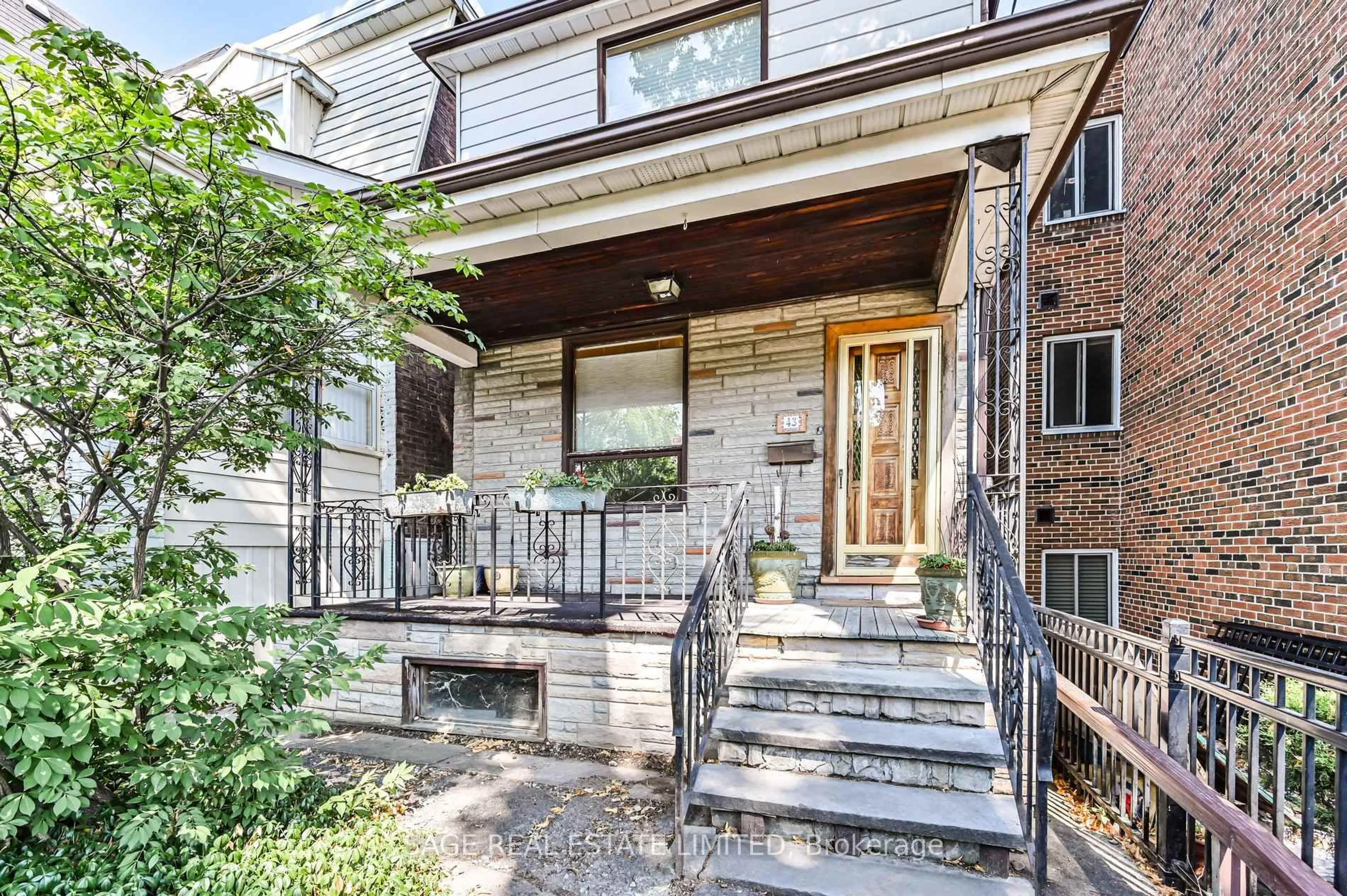 Home with brick exterior material, street for 43 Eaton Ave, Toronto Ontario M4J 2Z4