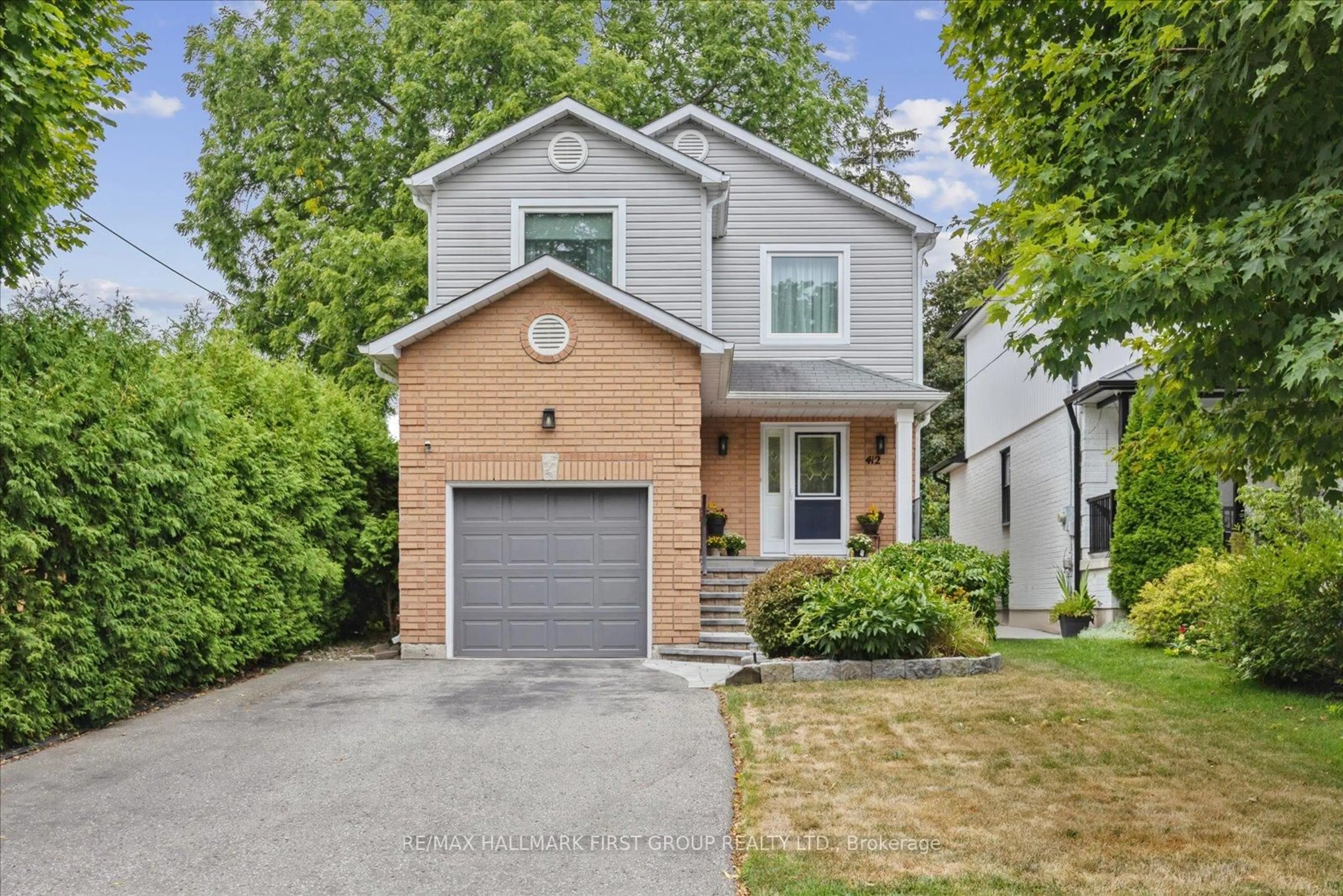 Home with brick exterior material, street for 412 Athol St, Whitby Ontario L1N 3Z6