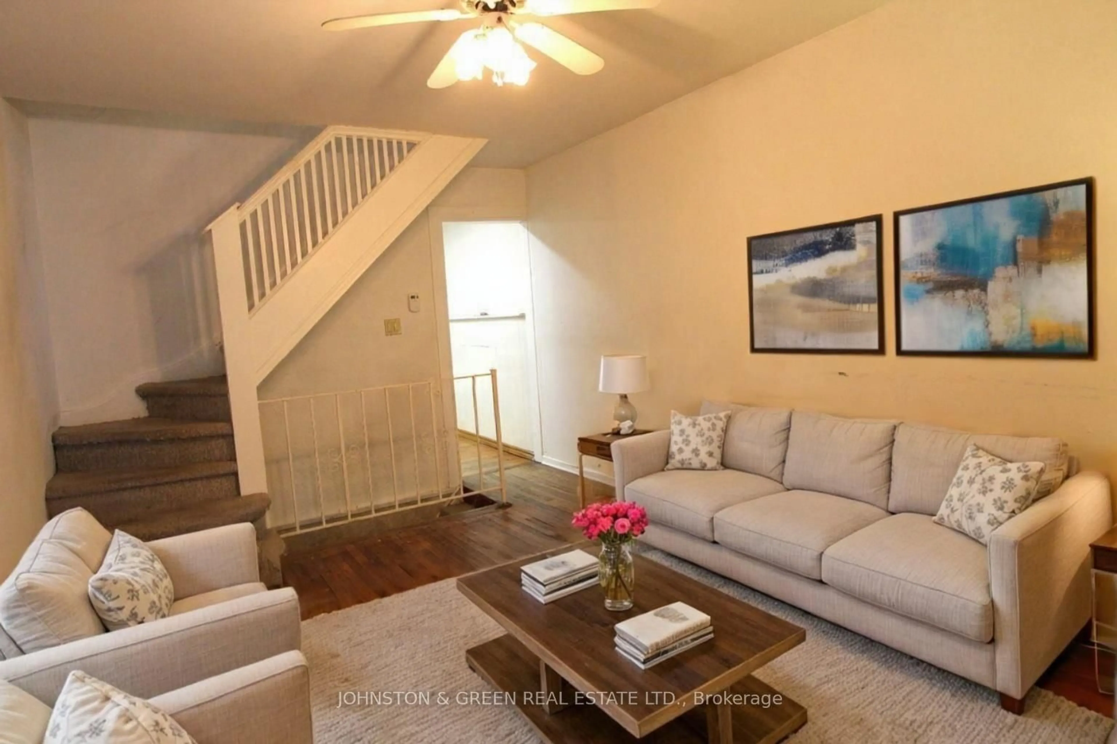 Living room with furniture, unknown for 799 Sammon Ave, Toronto Ontario M4C 2E7