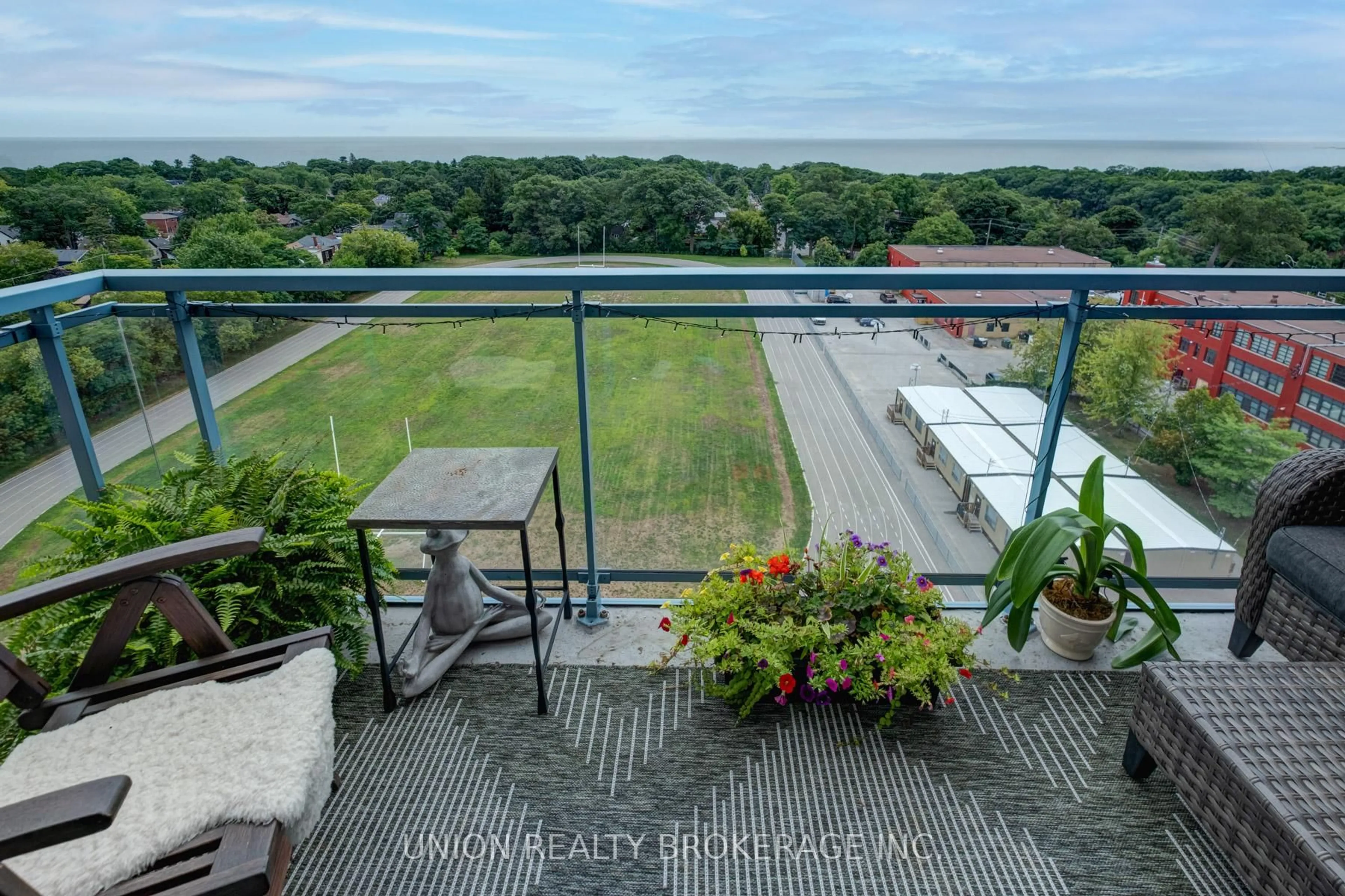 A pic from outside/outdoor area/front of a property/back of a property/a pic from drone, city buildings view from balcony for 1093 Kingston Rd #1204, Toronto Ontario M1N 4E2
