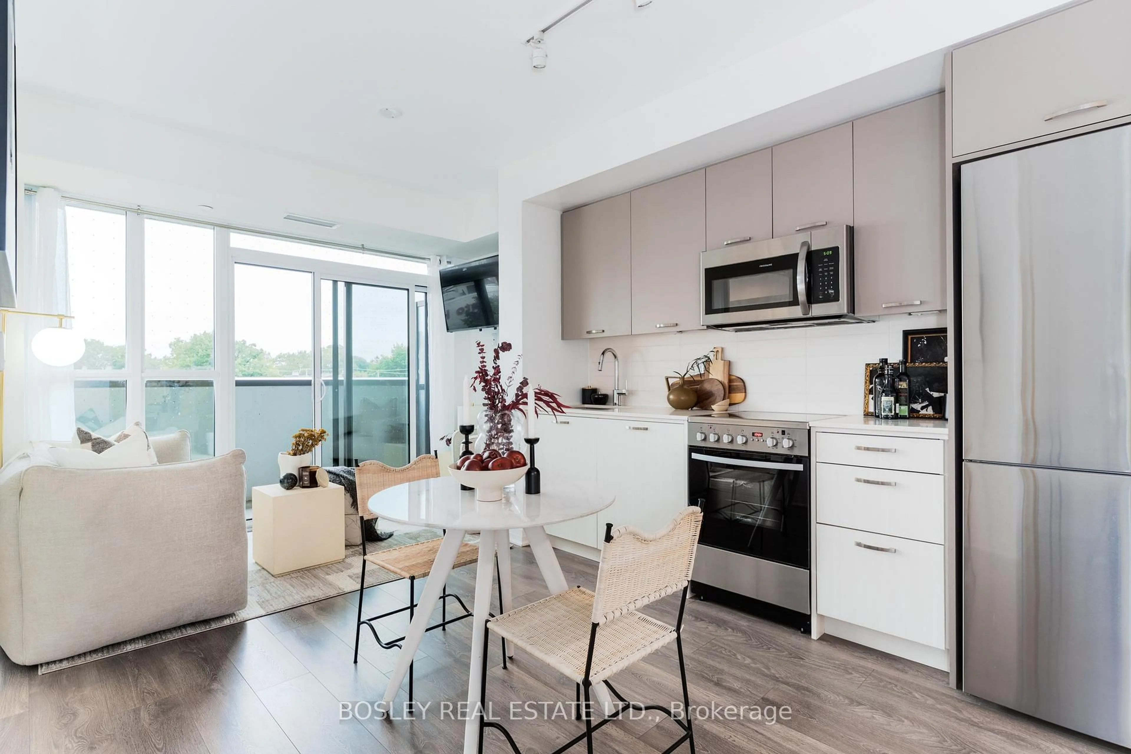 Open concept kitchen, wood/laminate floor for 2301 Danforth Ave #322, Toronto Ontario M4C 0A7