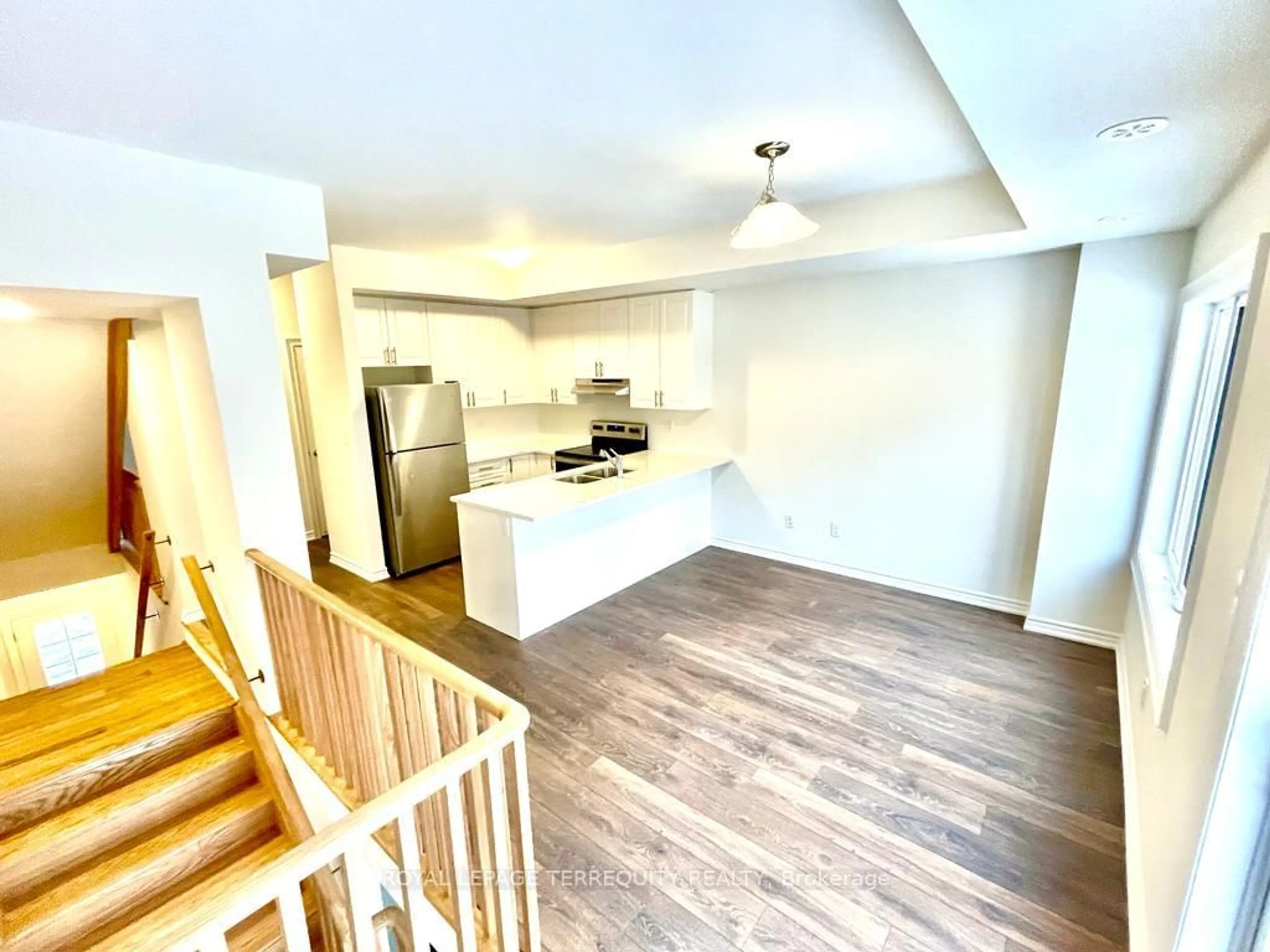 Open concept kitchen, wood/laminate floor for 2553 Barbarolli Path #116, Oshawa Ontario L1L 0P9