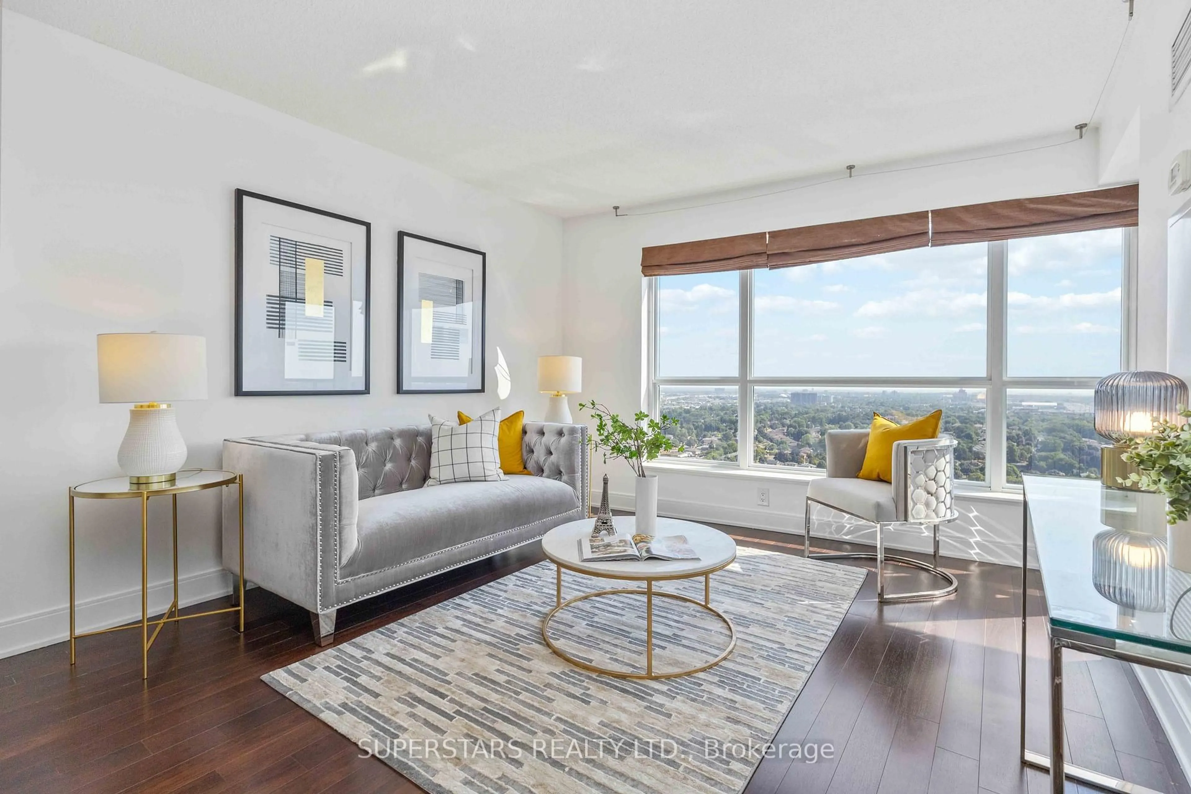 Living room with furniture, wood/laminate floor for 135 Village Green Sq #2726, Toronto Ontario M1S 0G4