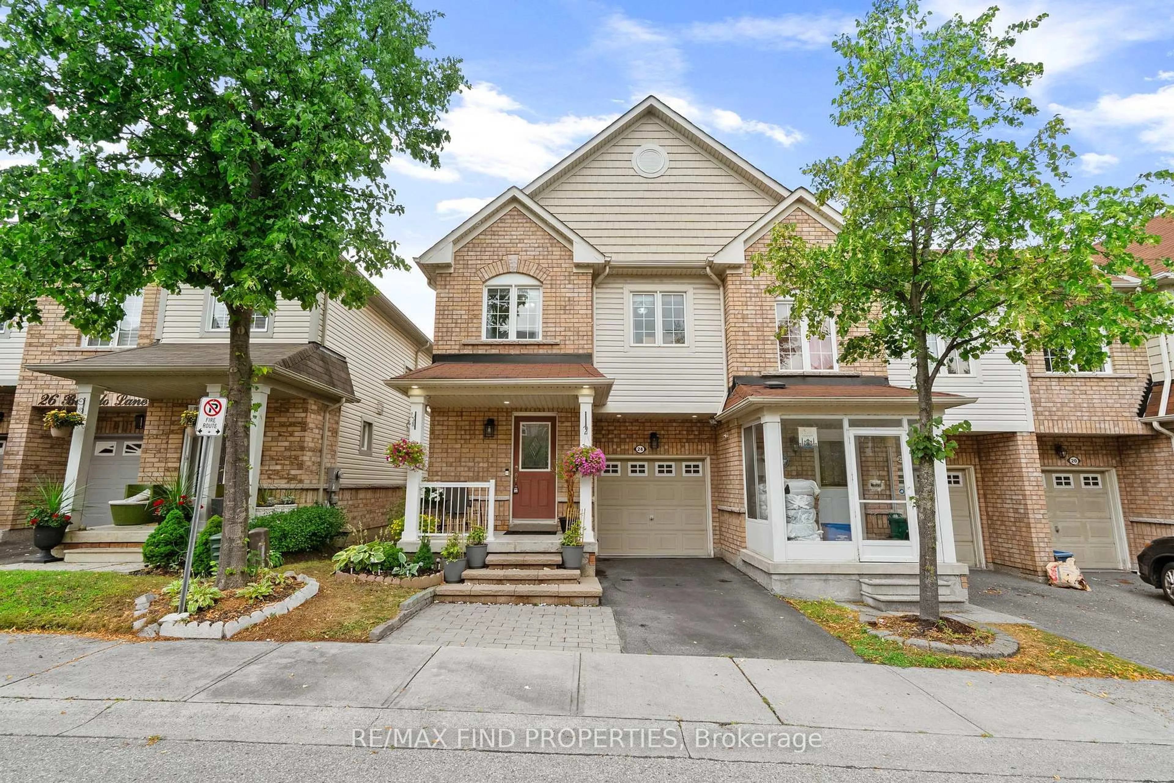 Home with brick exterior material, street for 24 Bartolo Lane, Ajax Ontario L1T 0C2