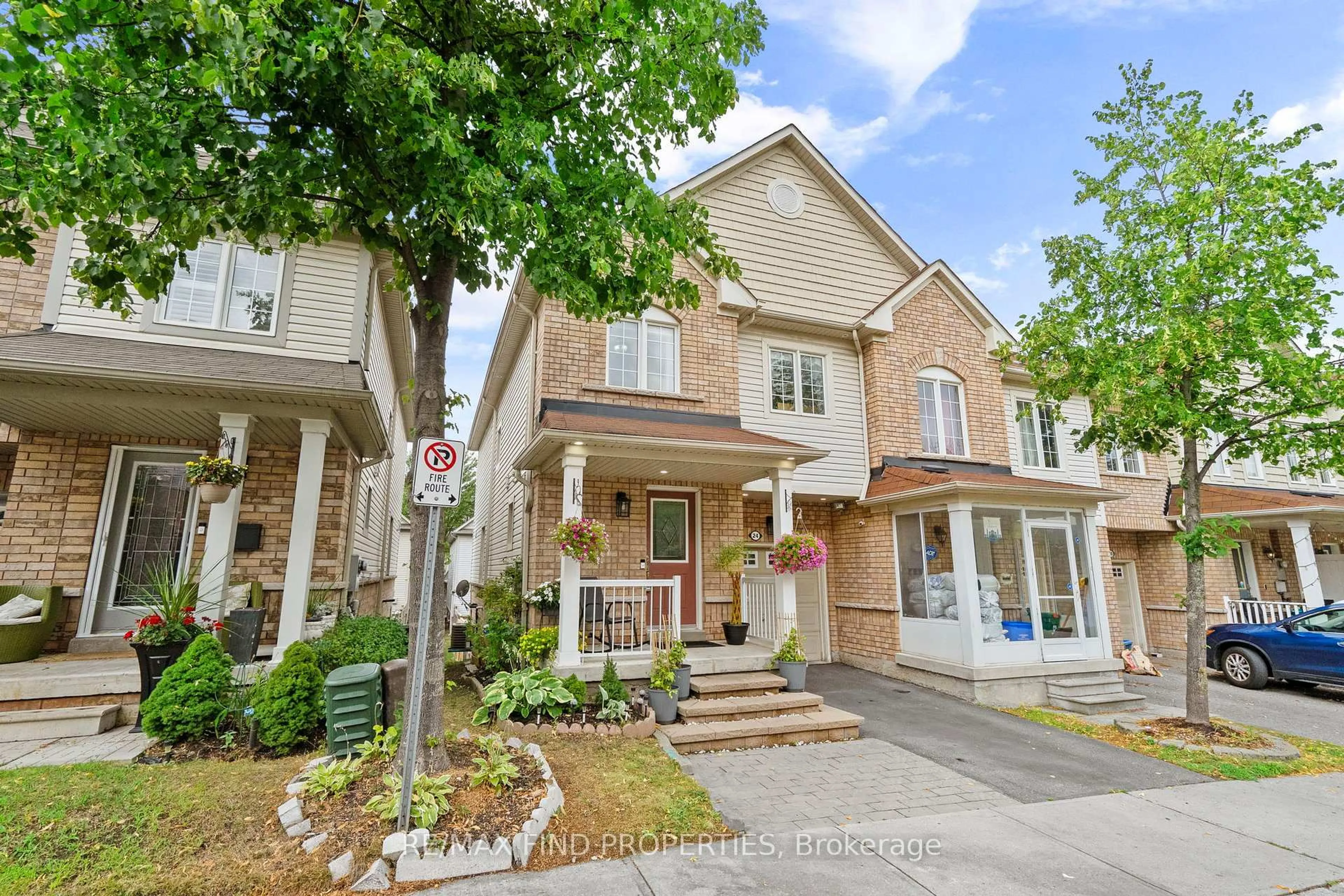 Home with brick exterior material, street for 24 Bartolo Lane, Ajax Ontario L1T 0C2