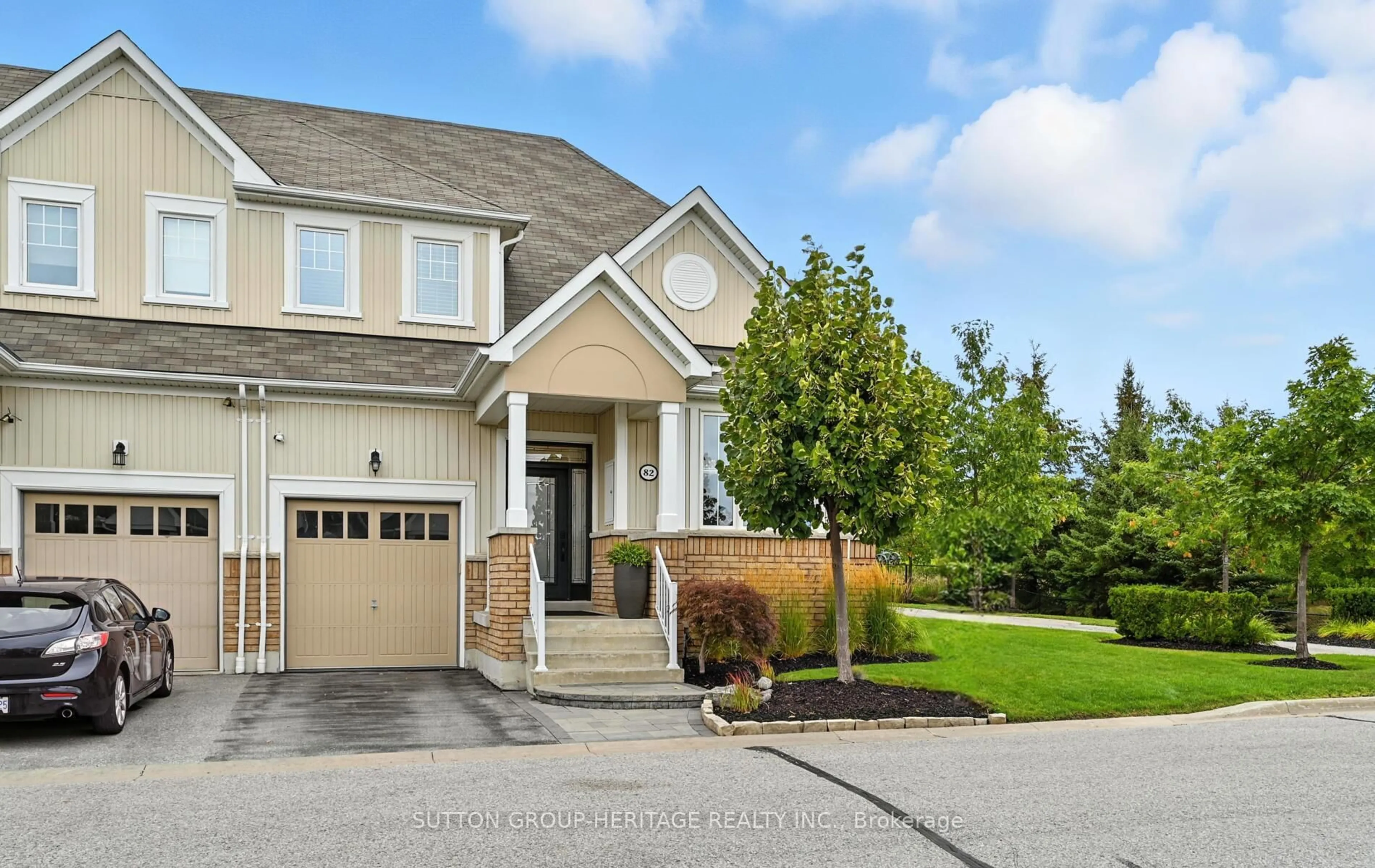 Home with vinyl exterior material, street for 82 Vallance Way, Whitby Ontario L1M 0J8