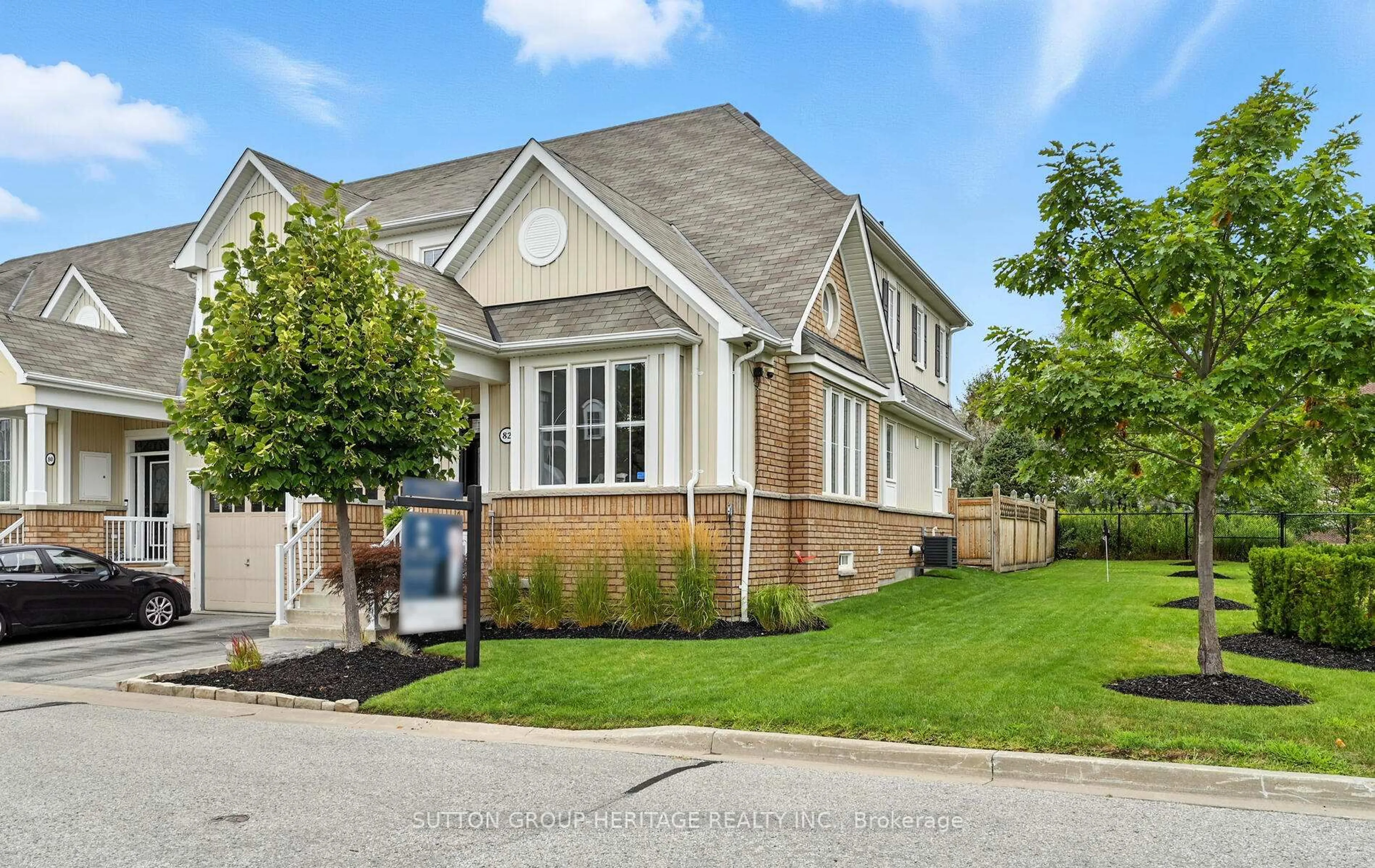 Home with brick exterior material, street for 82 Vallance Way, Whitby Ontario L1M 0J8