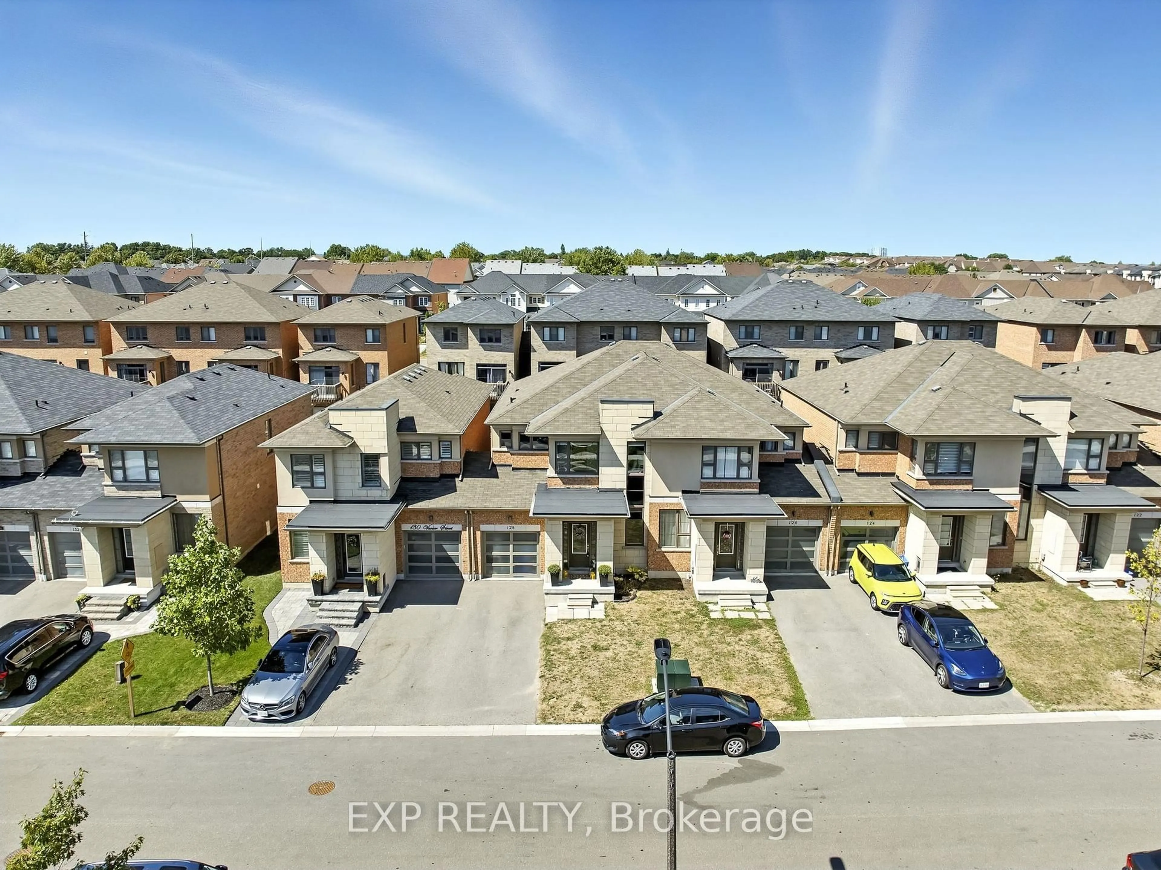 A pic from outside/outdoor area/front of a property/back of a property/a pic from drone, street for 128 Vanier St, Whitby Ontario L1R 0N3