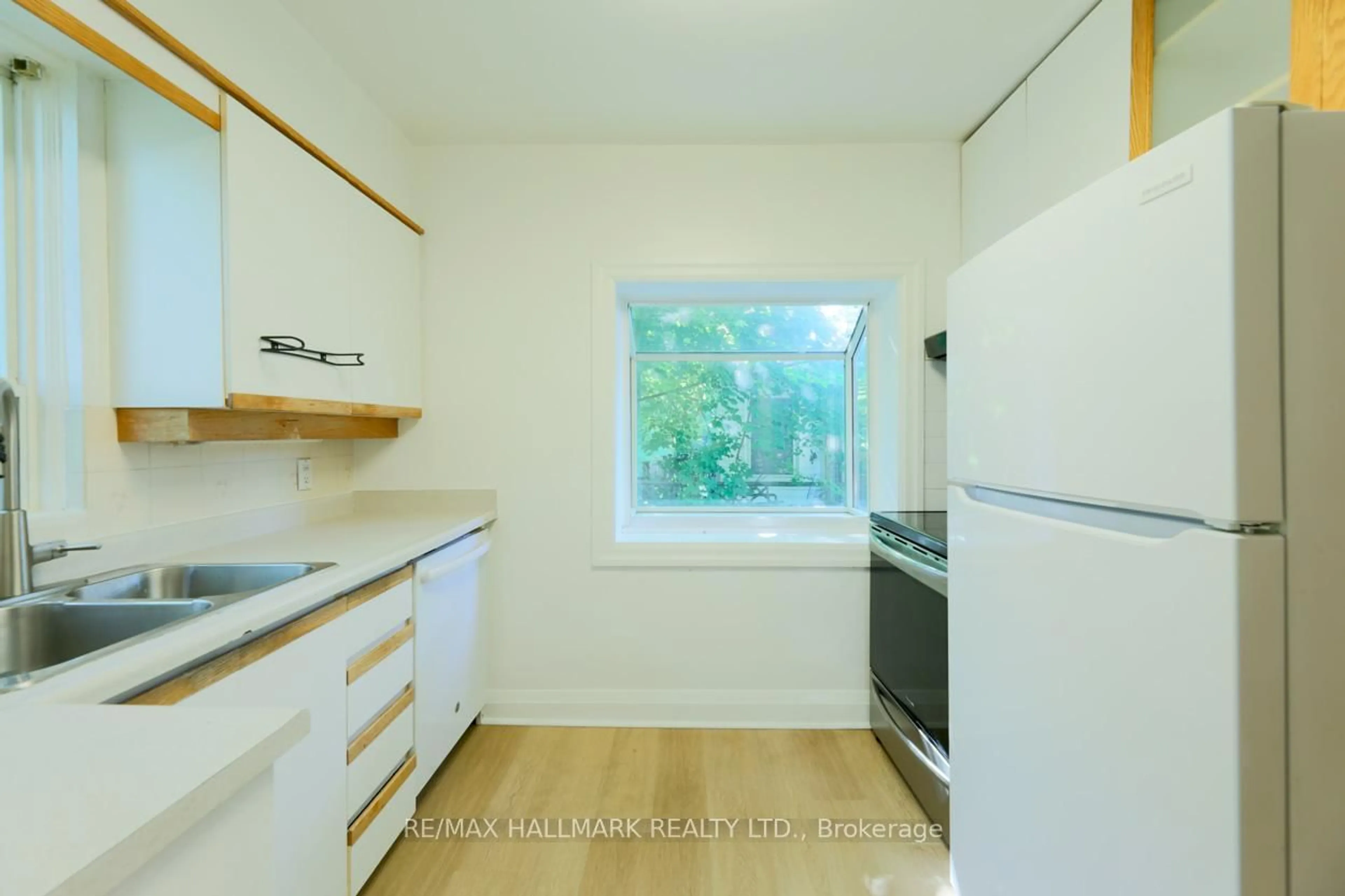 Standard kitchen, wood/laminate floor for 22 Latham Ave, Toronto Ontario M1N 1M8