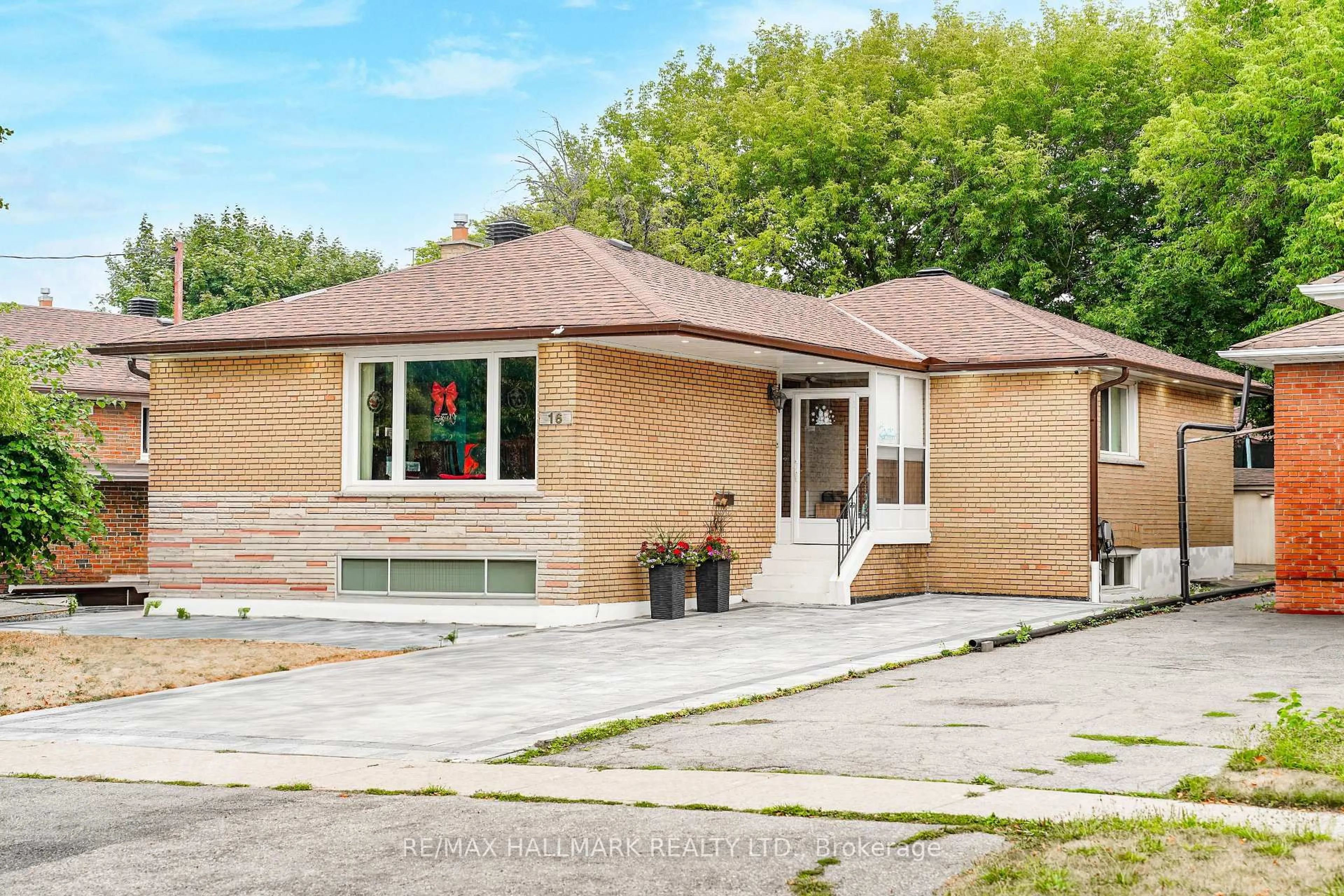 Home with brick exterior material, street for 16 Araman Dr, Toronto Ontario M1T 2P6