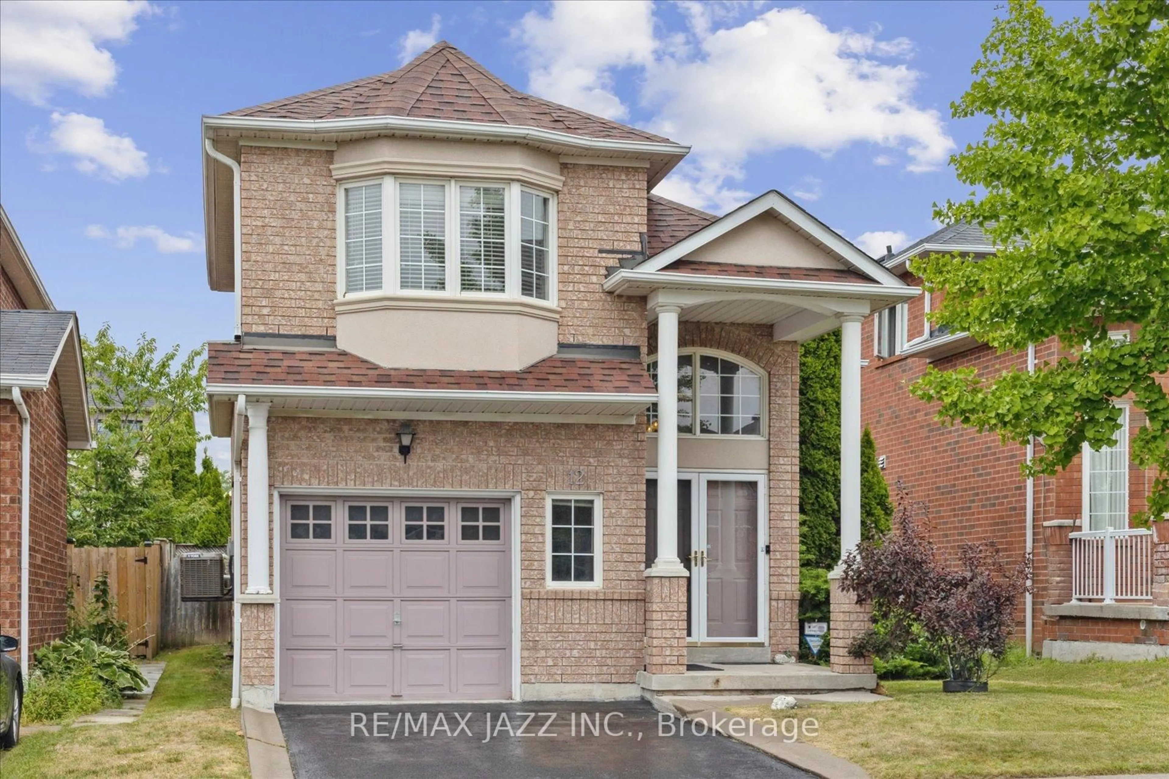 Home with brick exterior material, street for 12 Lacroix Crt, Whitby Ontario L1R 3B4