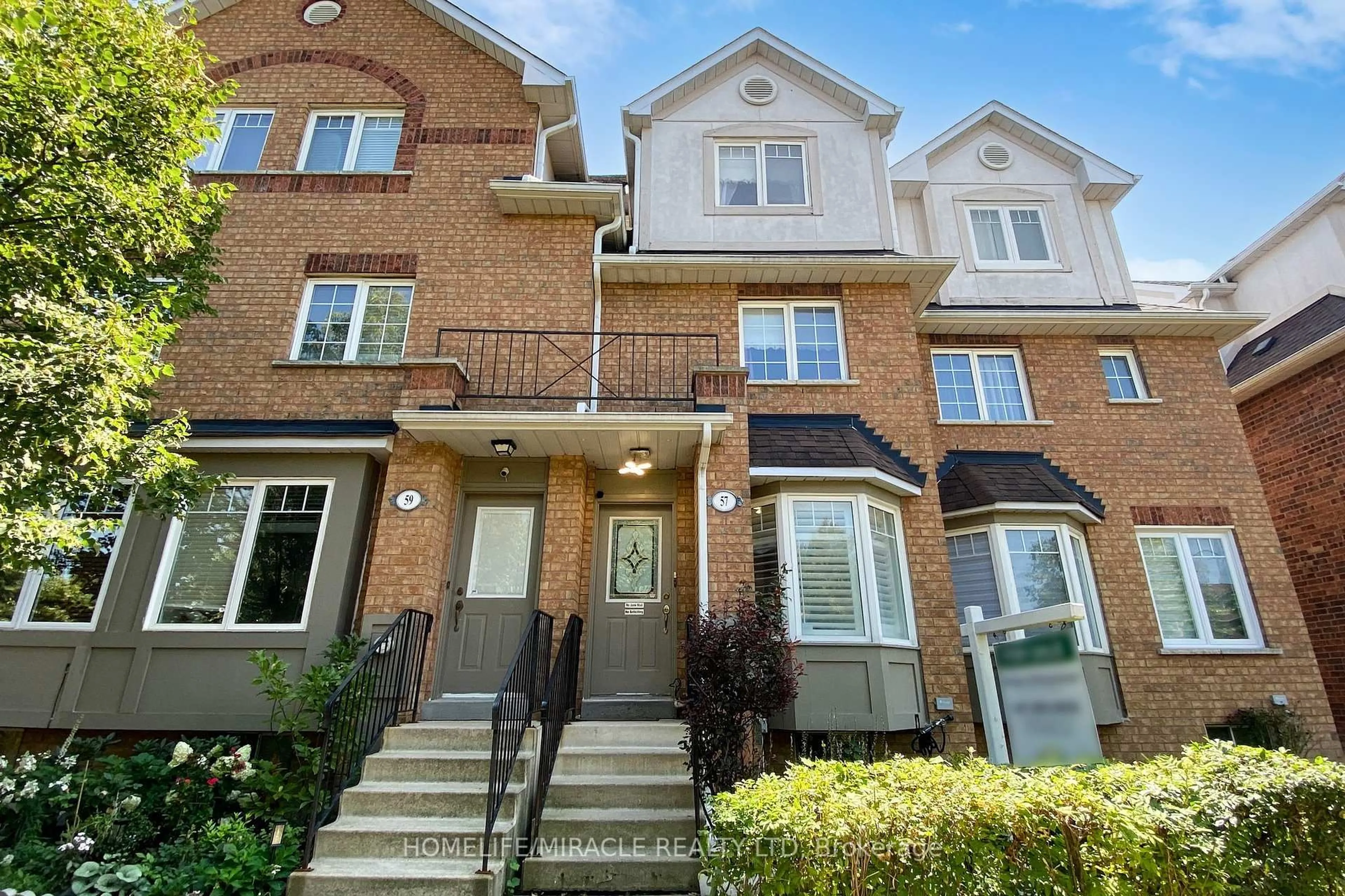 Home with brick exterior material, street for 57 Hedge End Rd #8, Toronto Ontario M1B 5Z4
