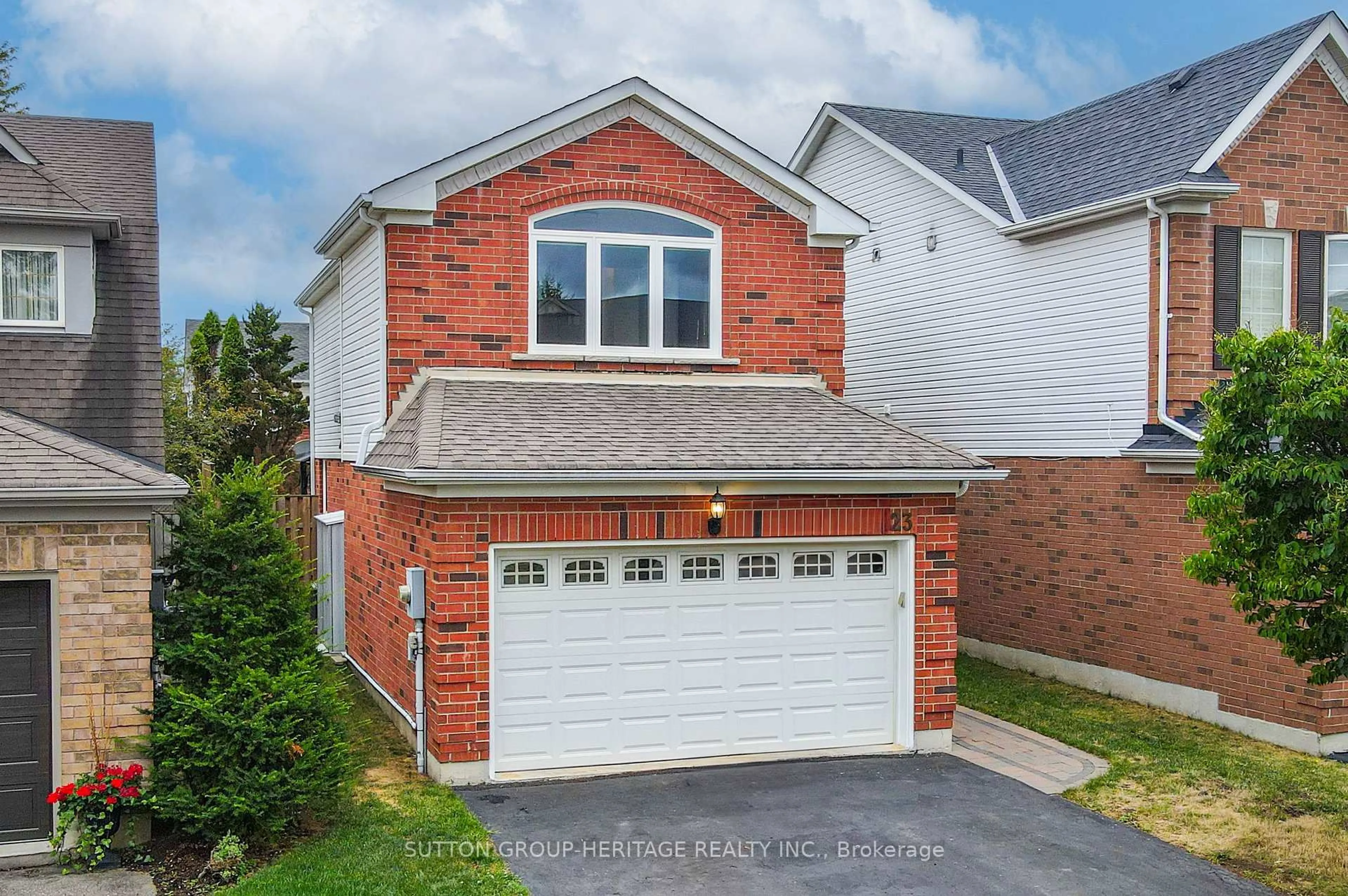 Home with brick exterior material, street for 23 Blacksmith Lane, Whitby Ontario L1P 1N1