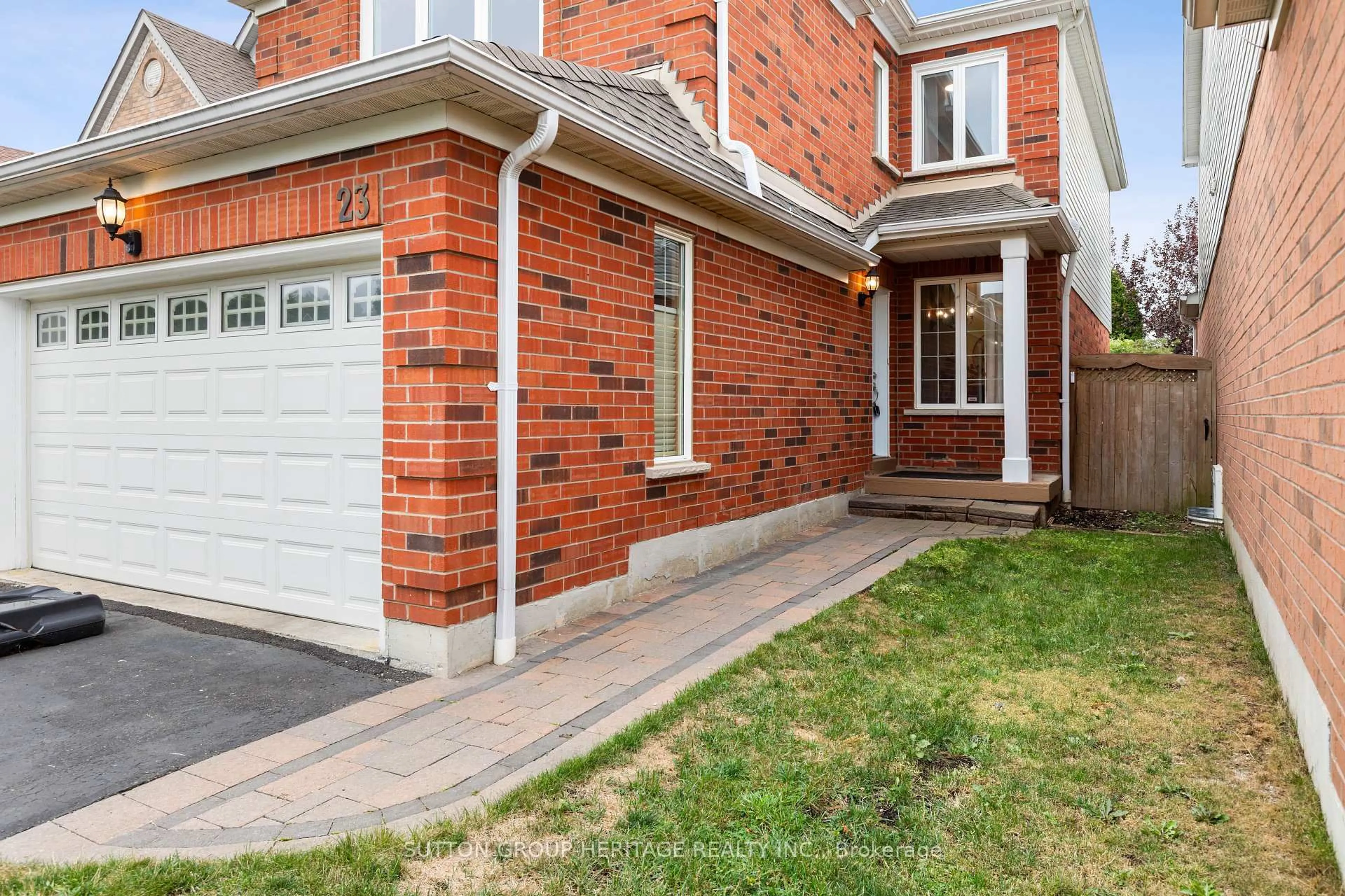 Home with brick exterior material, street for 23 Blacksmith Lane, Whitby Ontario L1P 1N1