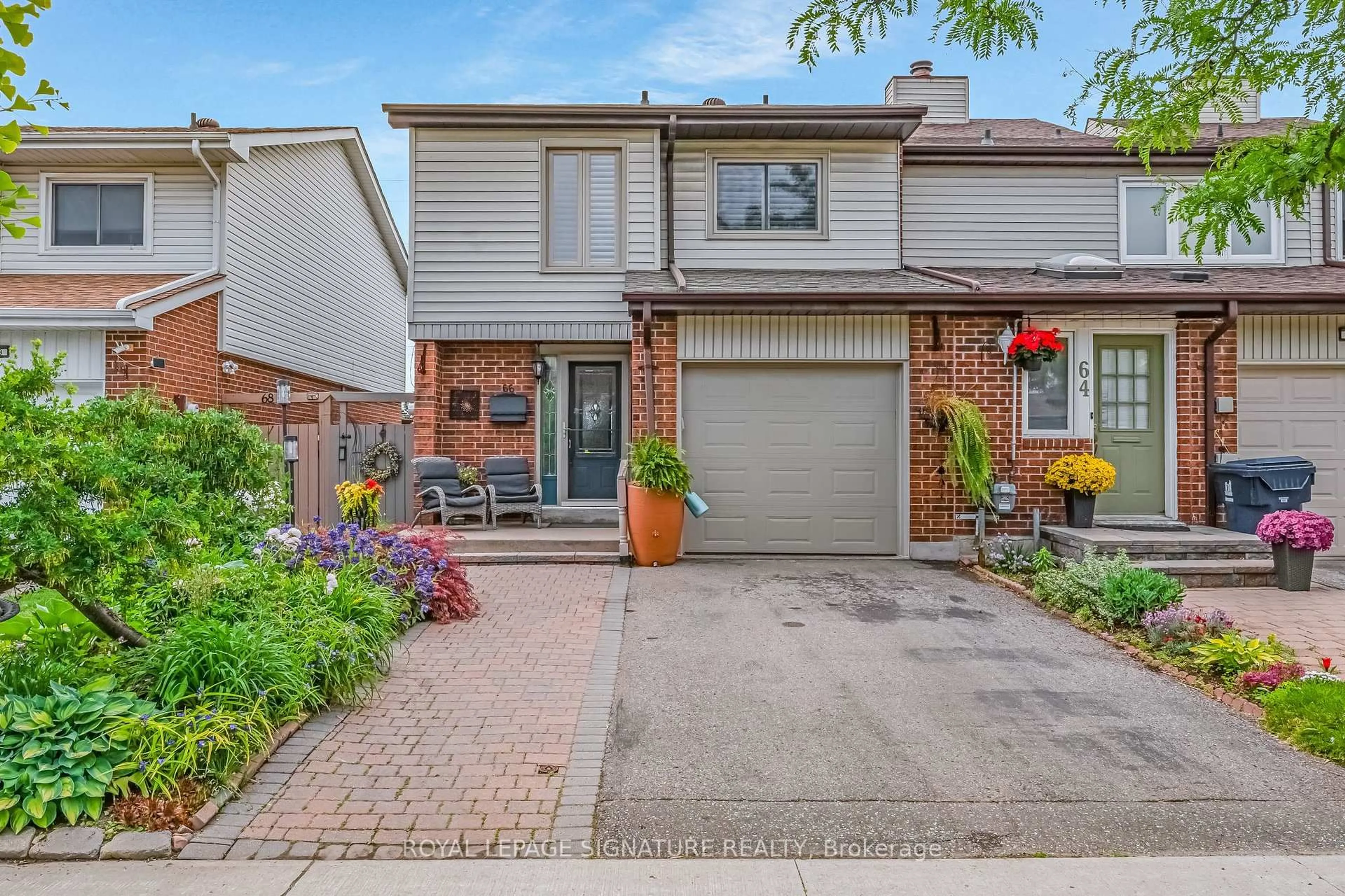 Home with brick exterior material, street for 66 Springhouse Sq, Toronto Ontario M1W 2X1