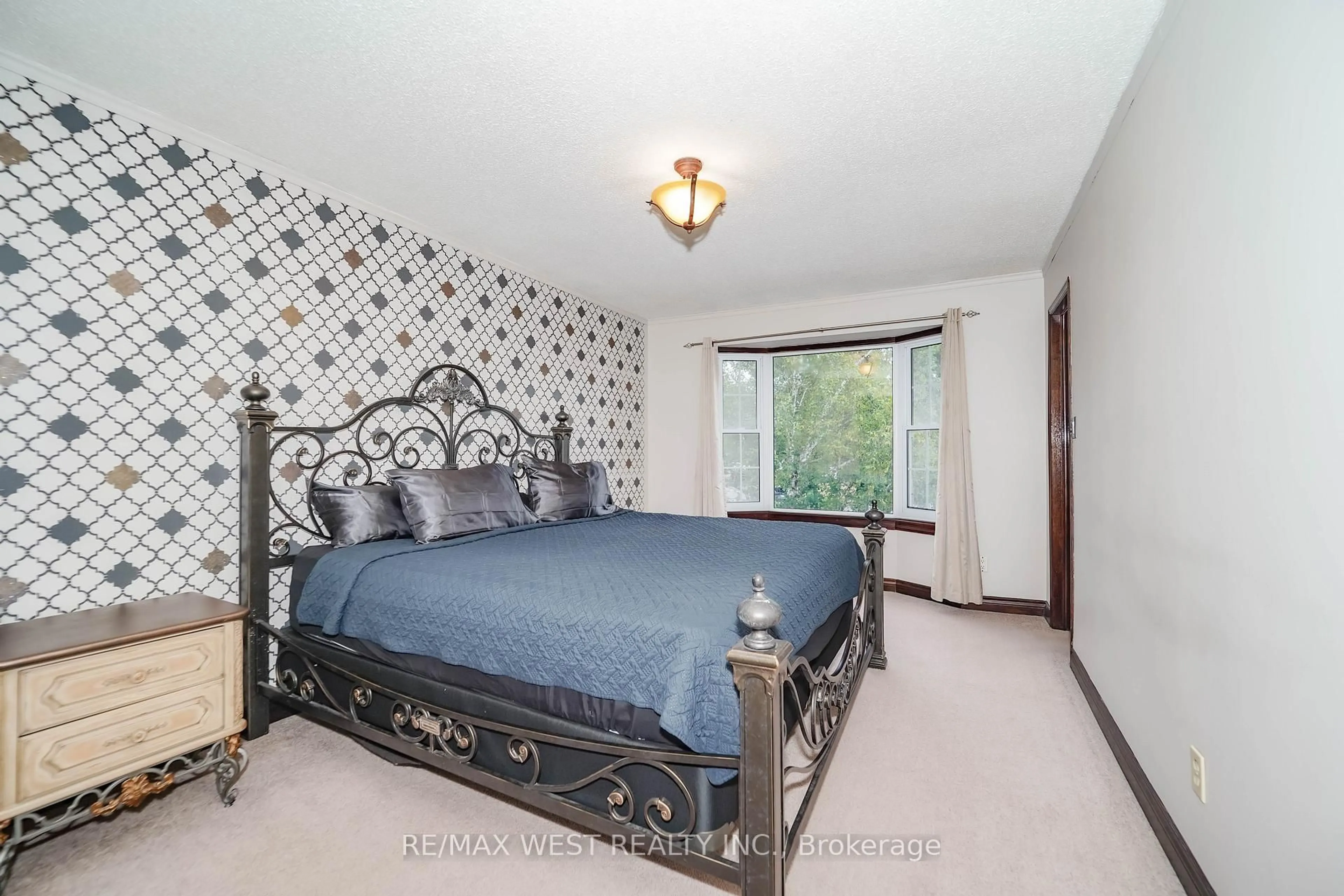 Bedroom with bed, carpet floor for 354 Blackthorn St, Oshawa Ontario L1K 1K9