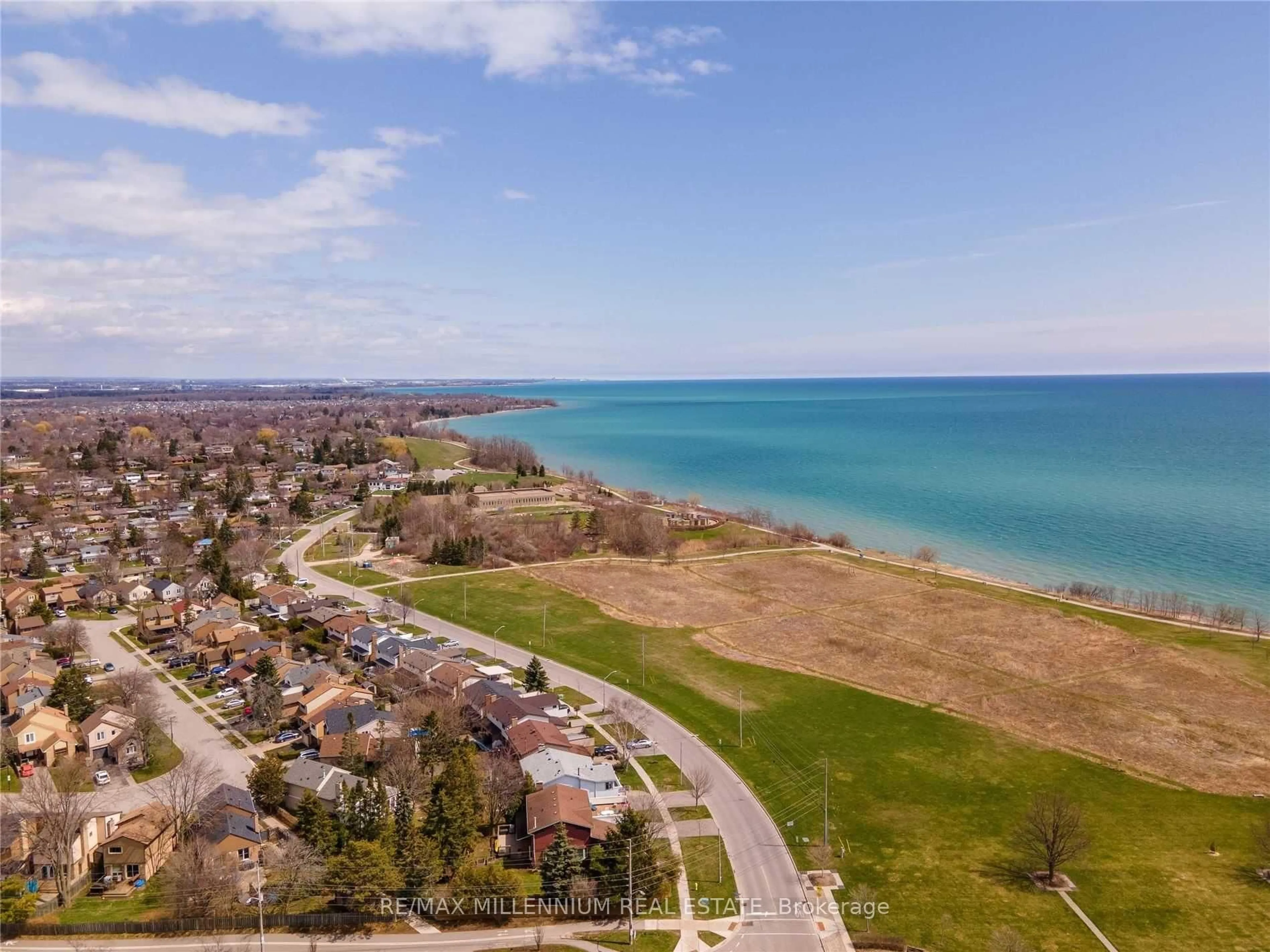 A pic from outside/outdoor area/front of a property/back of a property/a pic from drone, water/lake/river/ocean view for 62 Cumberland Lane, Ajax Ontario L1S 7K4