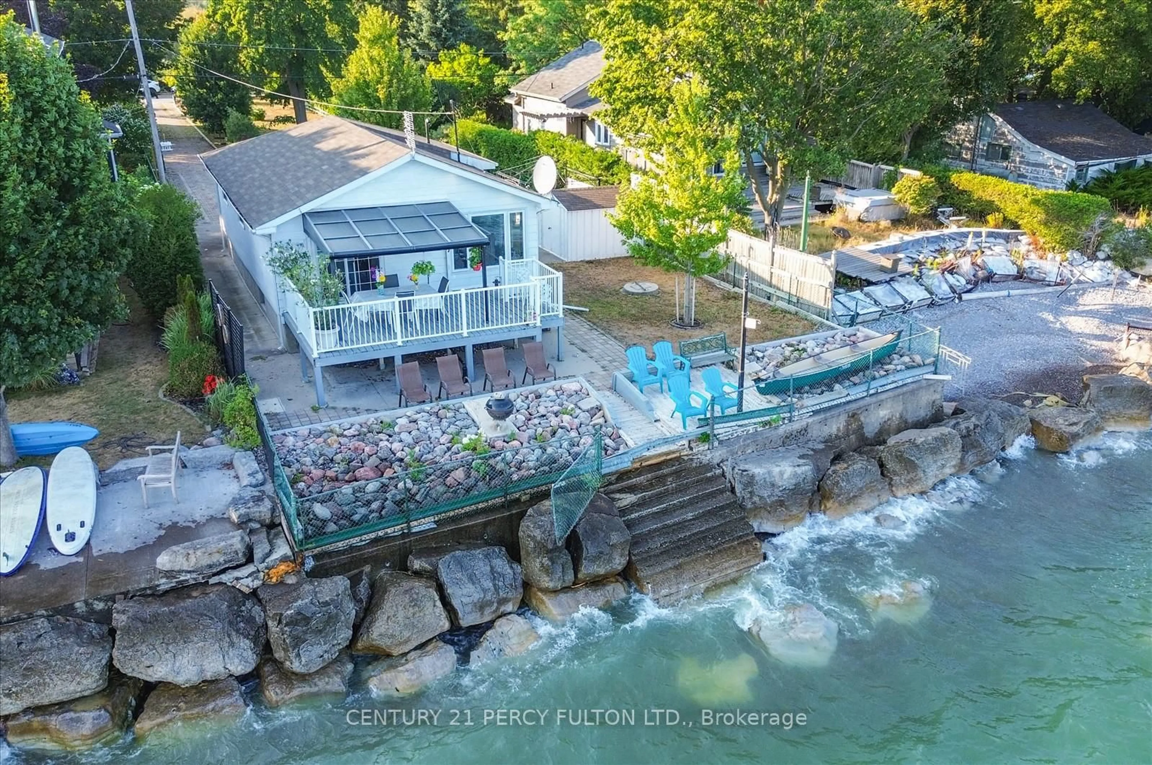 A pic from outside/outdoor area/front of a property/back of a property/a pic from drone, water/lake/river/ocean view for 135 Cedar Crest Beach Rd, Clarington Ontario L1C 3K3