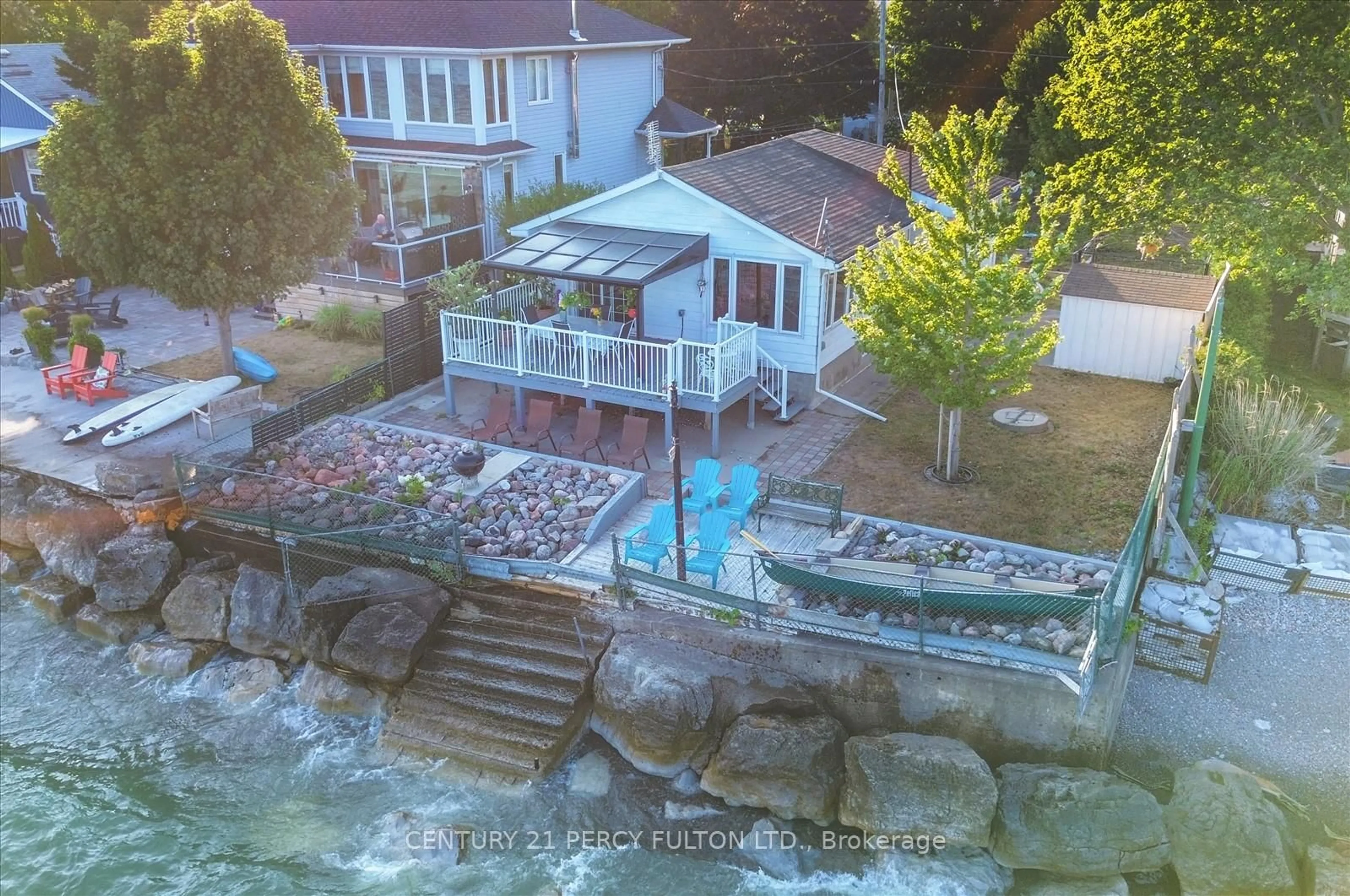 A pic from outside/outdoor area/front of a property/back of a property/a pic from drone, water/lake/river/ocean view for 135 Cedar Crest Beach Rd, Clarington Ontario L1C 3K3