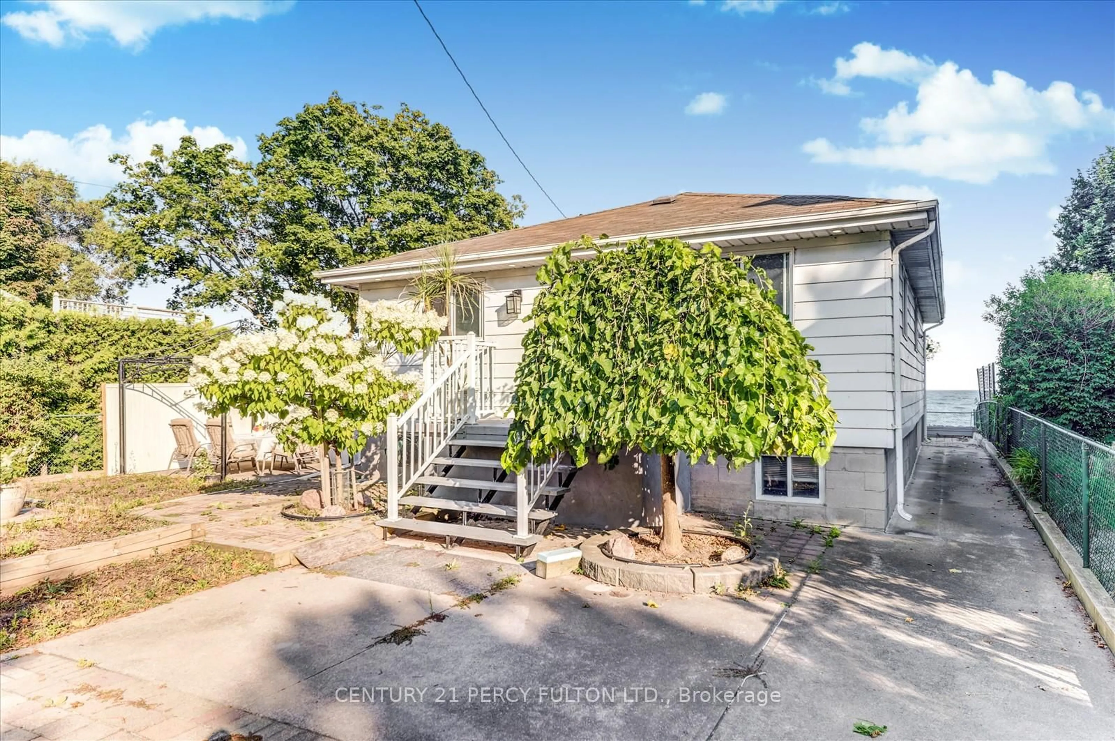 A pic from outside/outdoor area/front of a property/back of a property/a pic from drone, street for 135 Cedar Crest Beach Rd, Clarington Ontario L1C 3K3