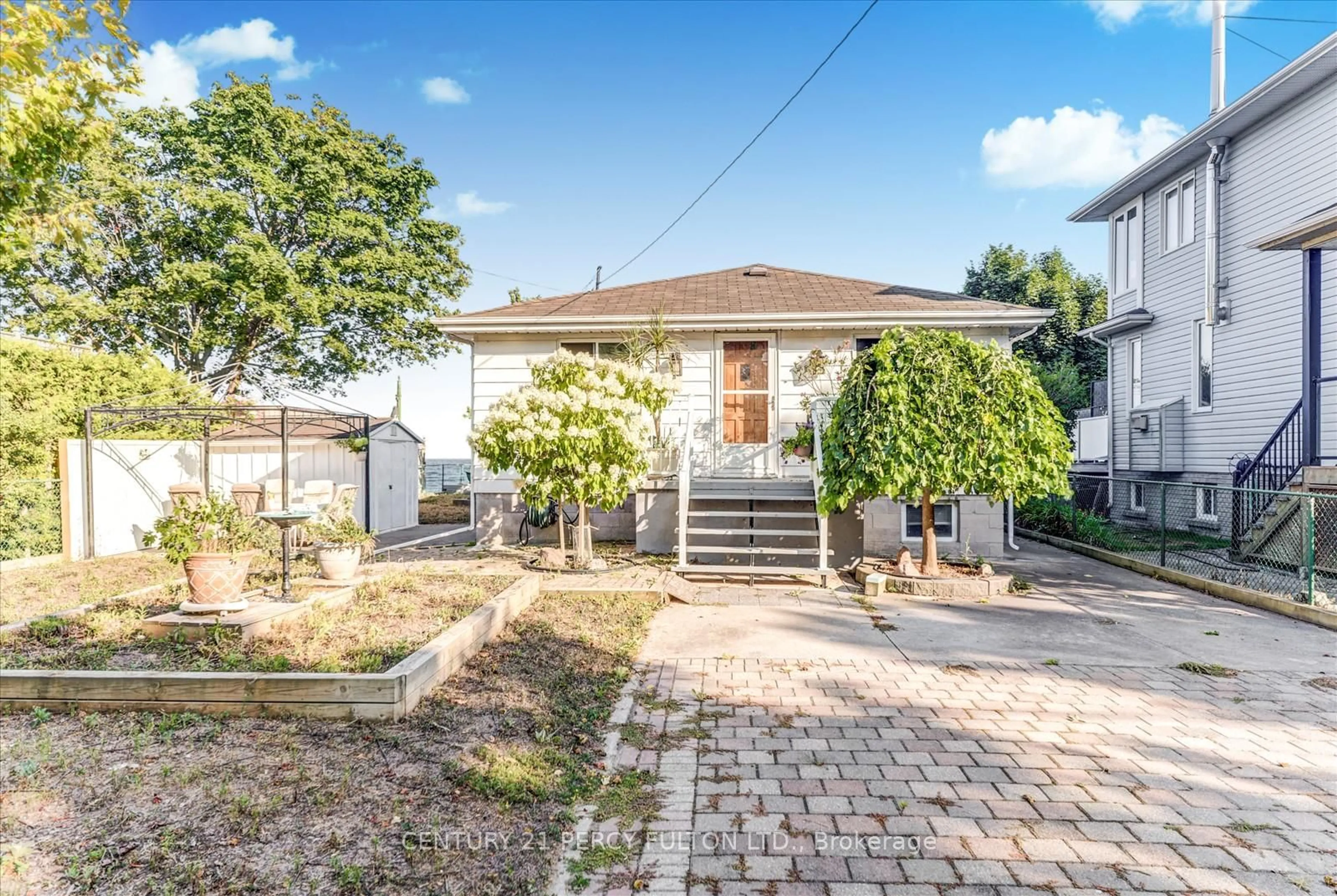 A pic from outside/outdoor area/front of a property/back of a property/a pic from drone, street for 135 Cedar Crest Beach Rd, Clarington Ontario L1C 3K3