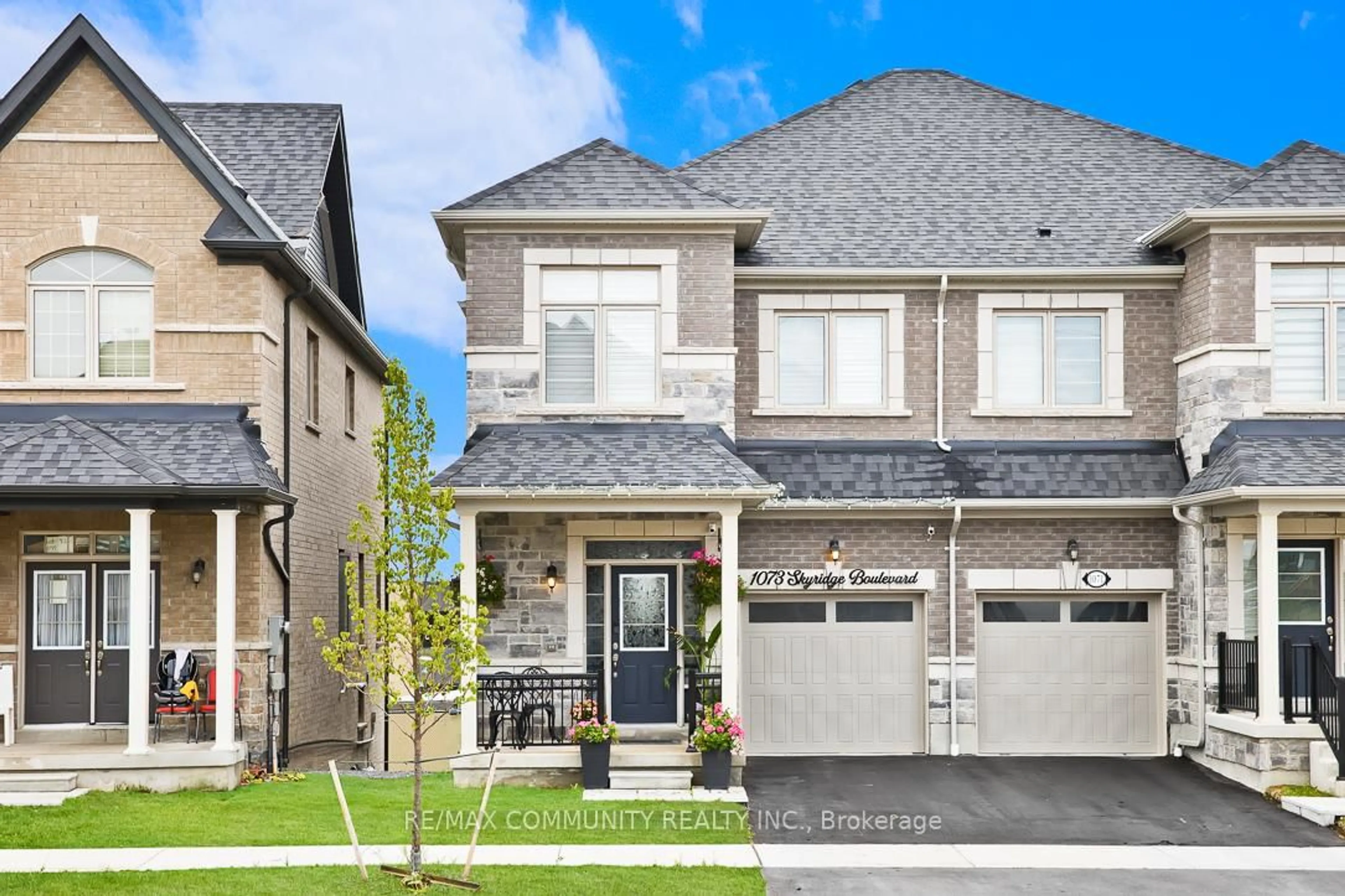 Home with brick exterior material, street for 1073 Skyridge Blvd, Pickering Ontario L1X 0M8