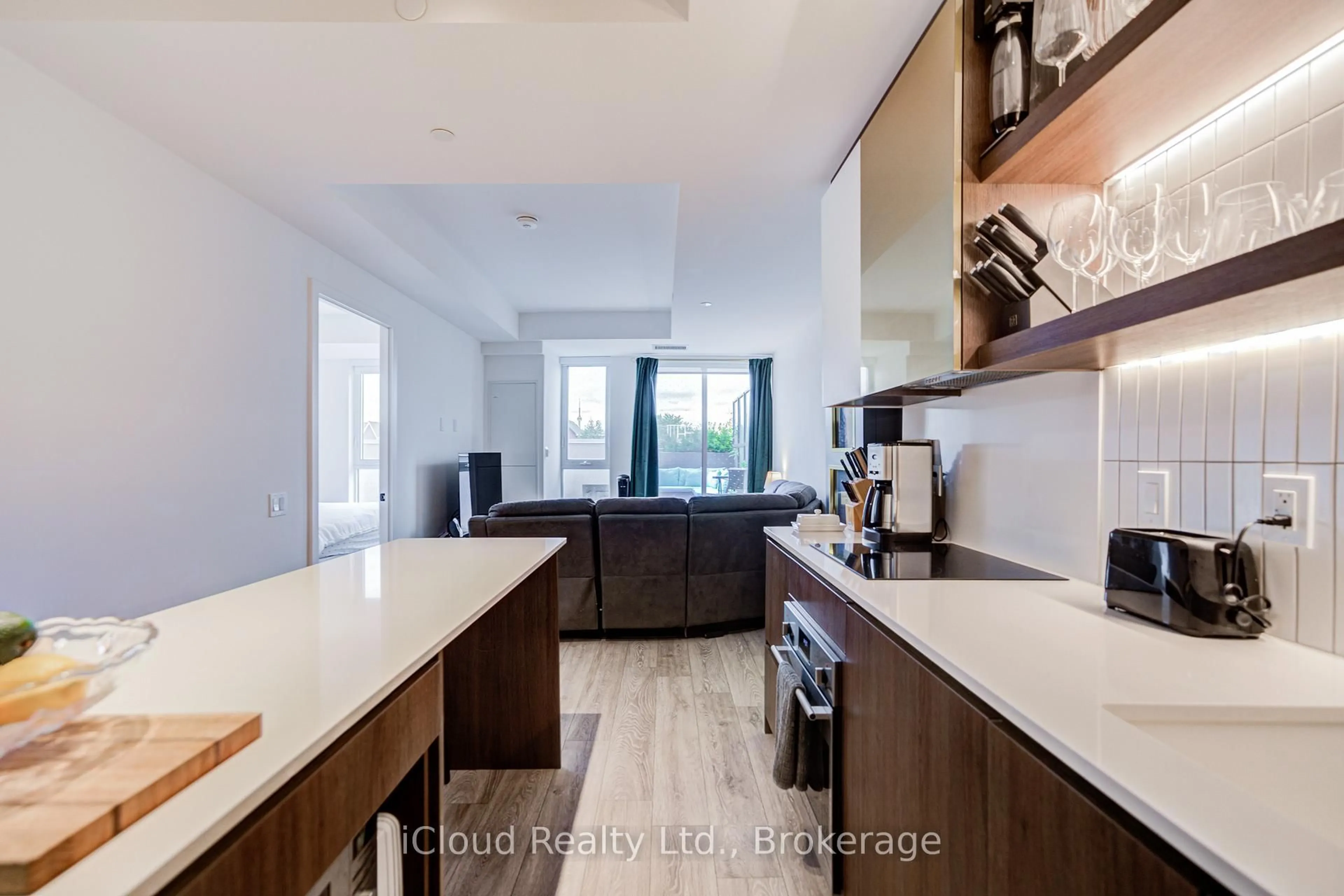 Open concept kitchen, unknown for 1285 Queen St #211, Toronto Ontario M4L 1C2