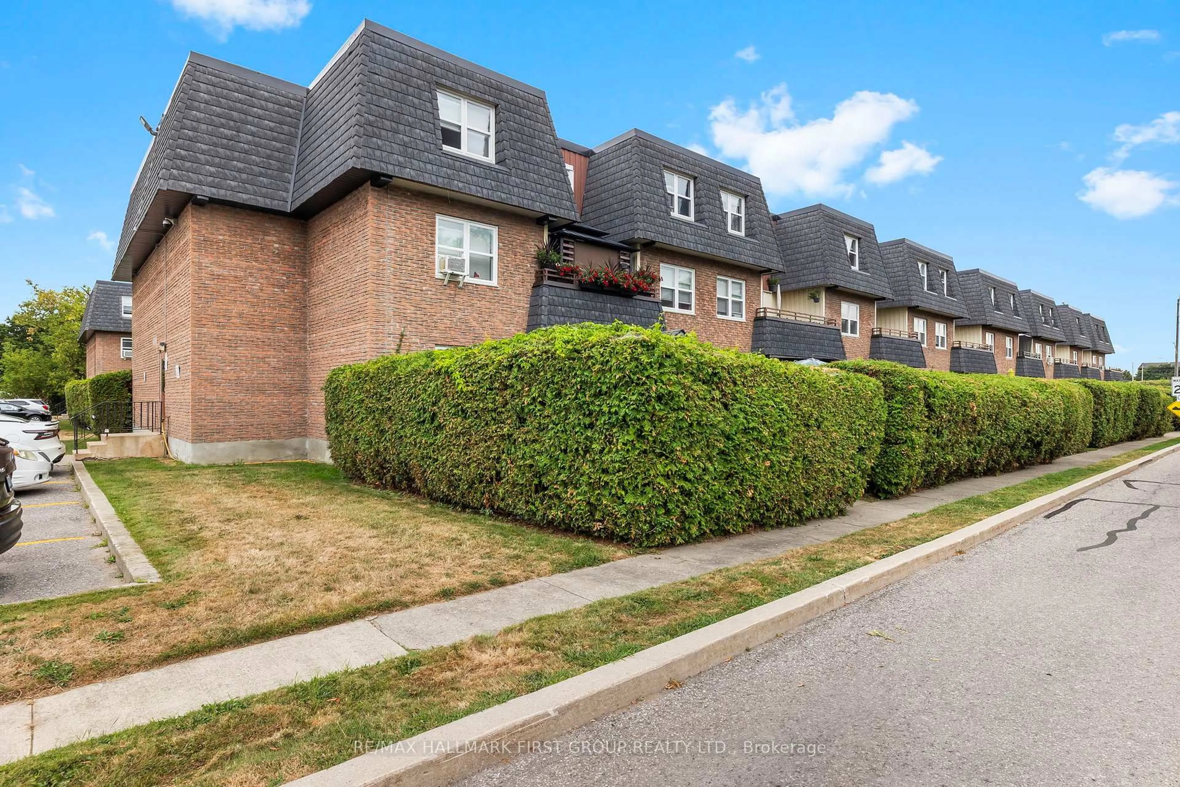 Home with brick exterior material, street for 580 Mary St #104, Whitby Ontario L1N 2R3