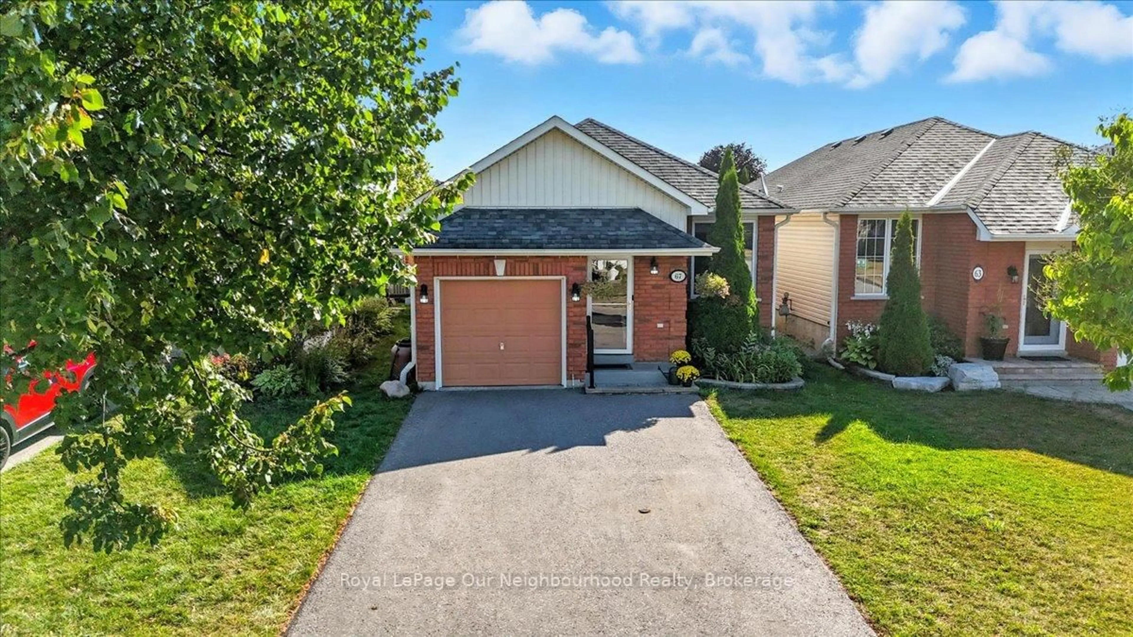 Home with brick exterior material, street for 67 Harmer Dr, Clarington Ontario L1B 1P7
