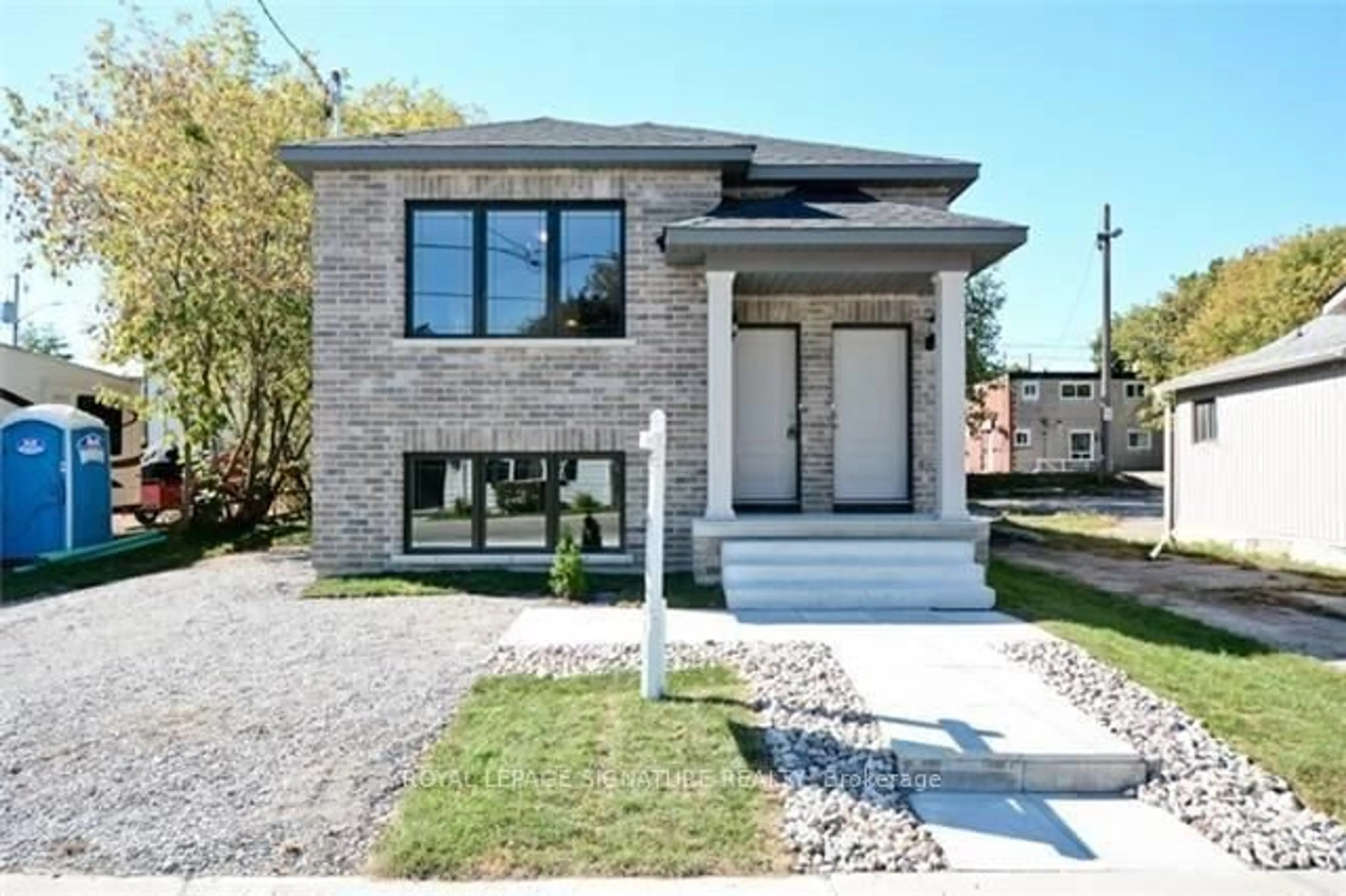 Home with brick exterior material, street for 214 Celina St, Oshawa Ontario L1H 4N6