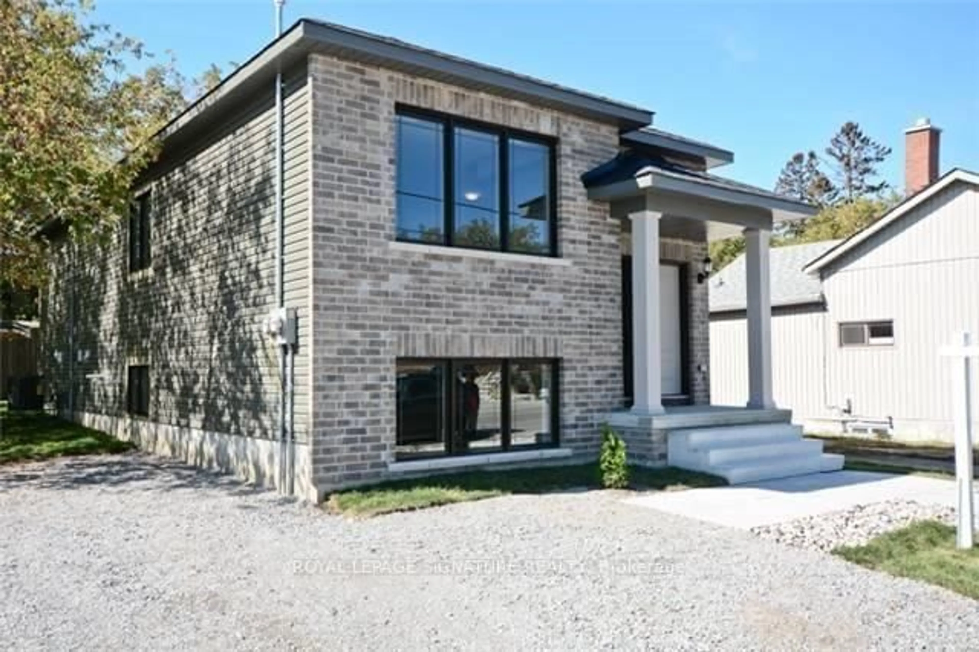 Home with brick exterior material, street for 214 Celina St, Oshawa Ontario L1H 4N6