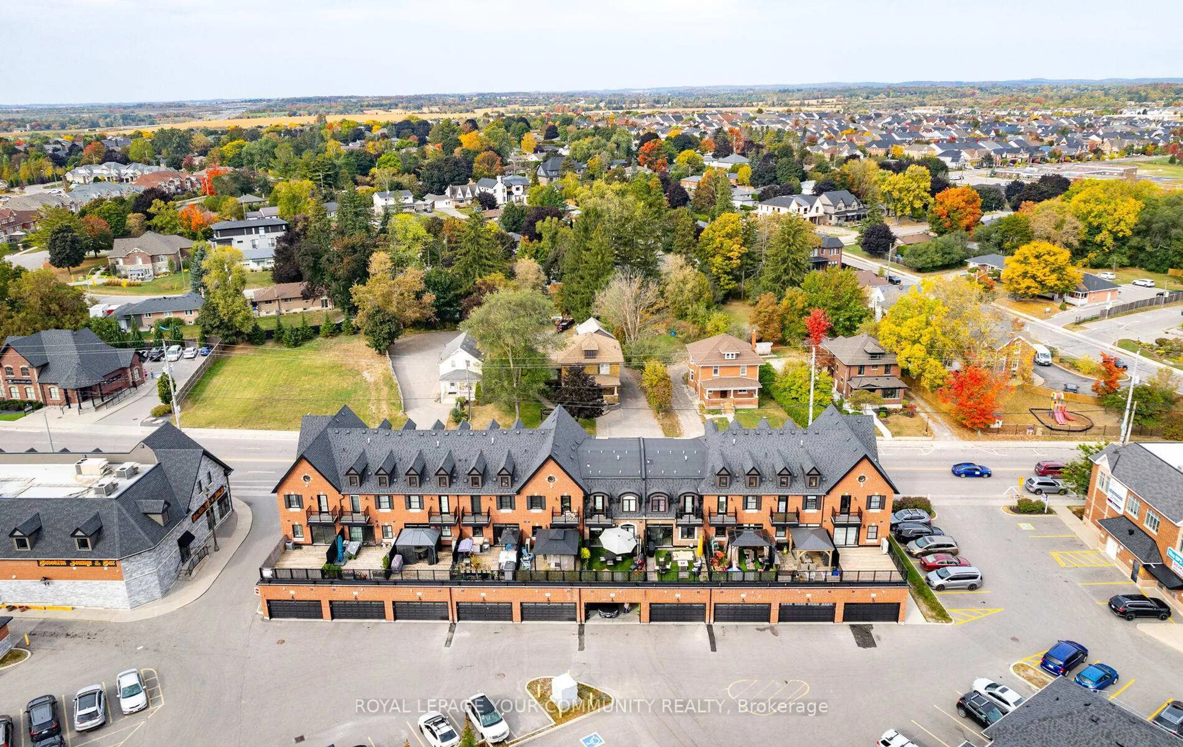 A pic from outside/outdoor area/front of a property/back of a property/a pic from drone, water/lake/river/ocean view for 17 Baldwin St #205, Whitby Ontario L1M 1A2
