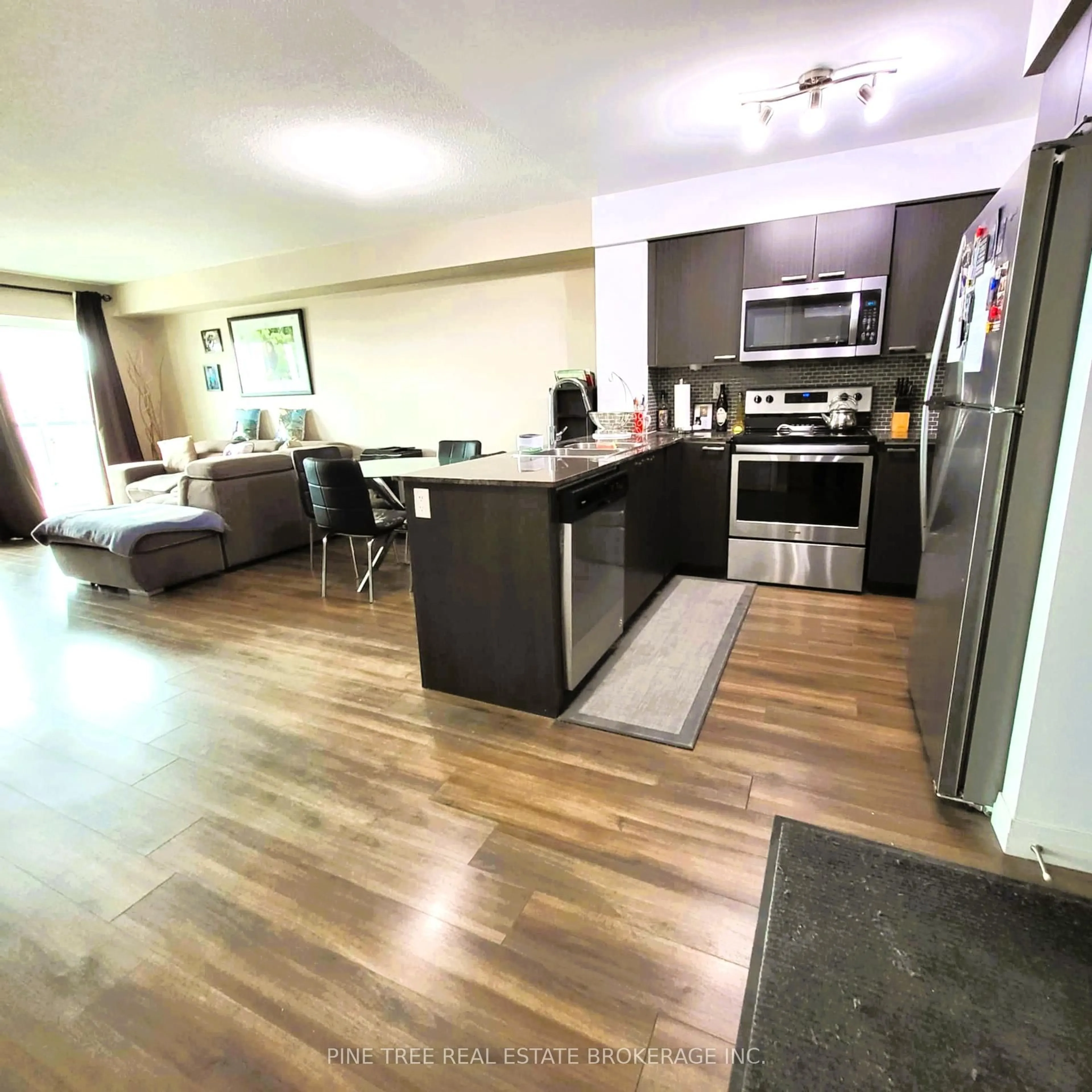 Open concept kitchen, unknown for 2150 Lawrence Ave #701, Toronto Ontario M1R 3A7